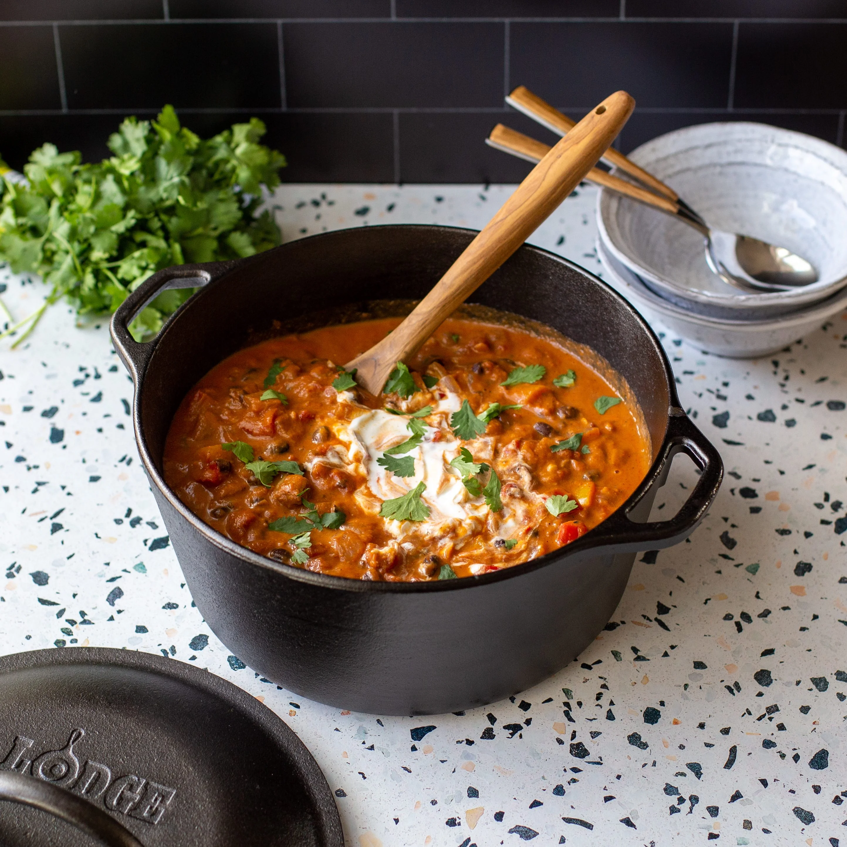Lodge Pre-Seasoned 5 Quart Cast Iron Dutch Oven with Loop Handles and Cast Iron Cover