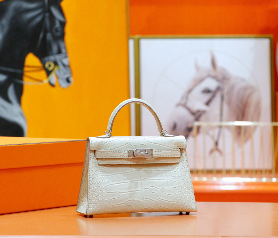 Hermes Minikelly 2nd generation, matte crocodile skin, cream white, silver buckle, 19cm