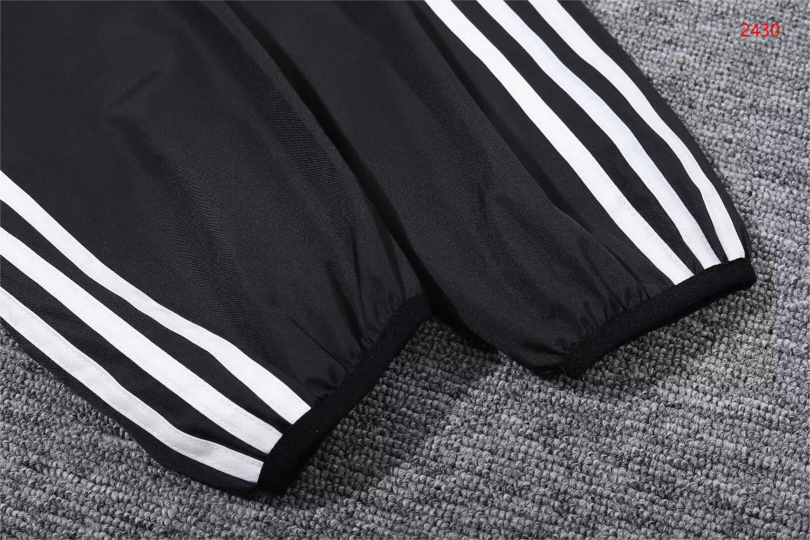 2023/24 Manchester United black and red hooded windbreaker 1:1 Thai quality