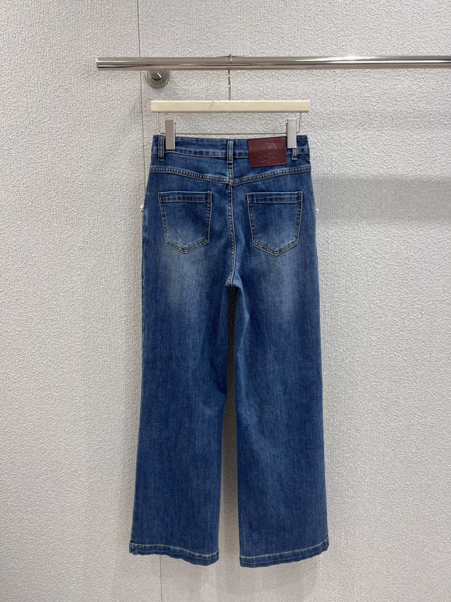 Pearl and diamond embellished wide-leg jeans