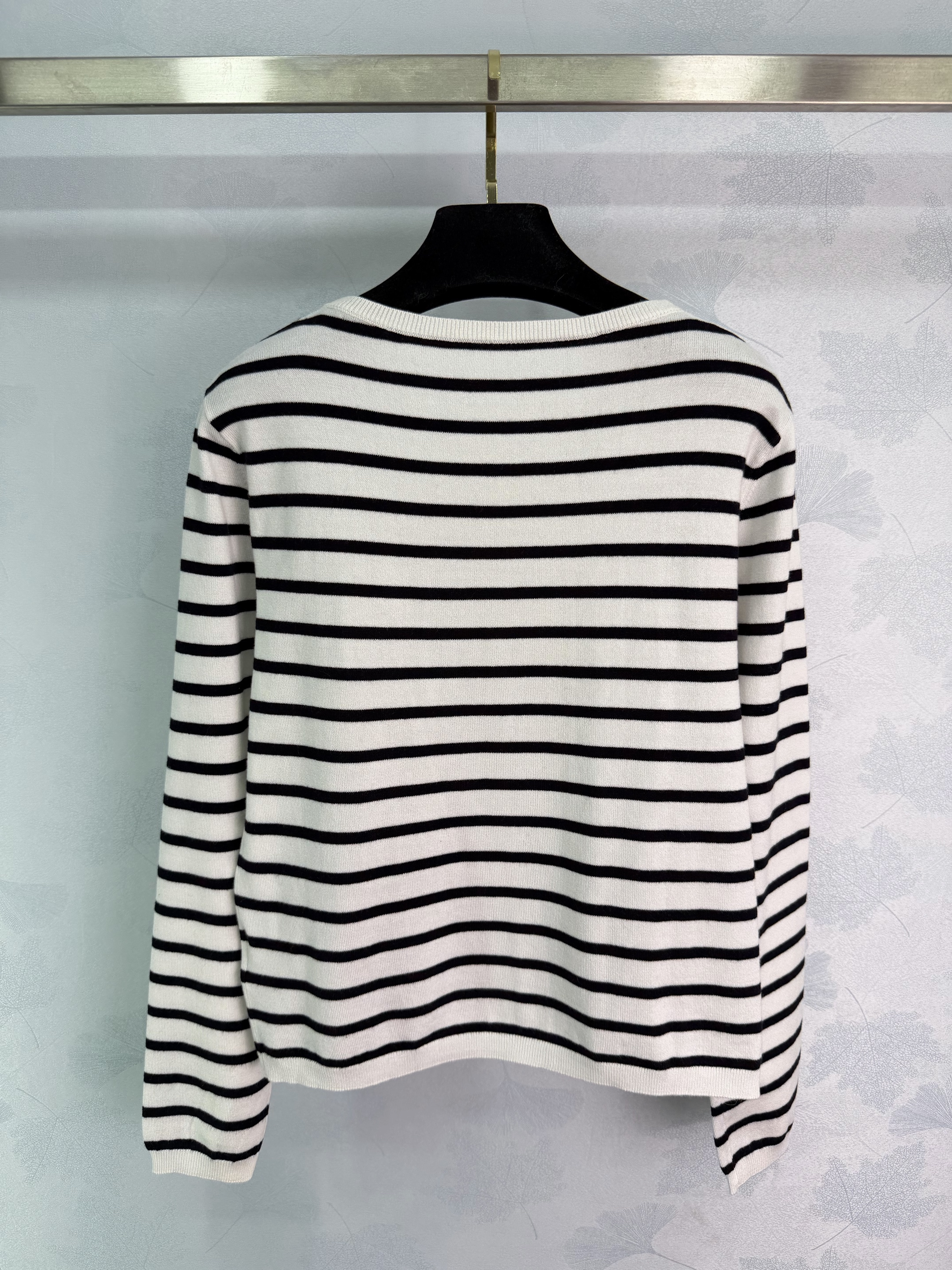Striped knit sweater  classic black and white color scheme