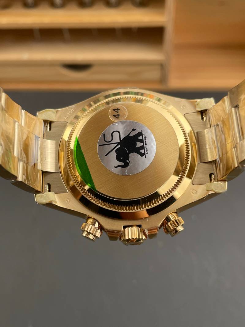 Rolex Daytona Green Gold