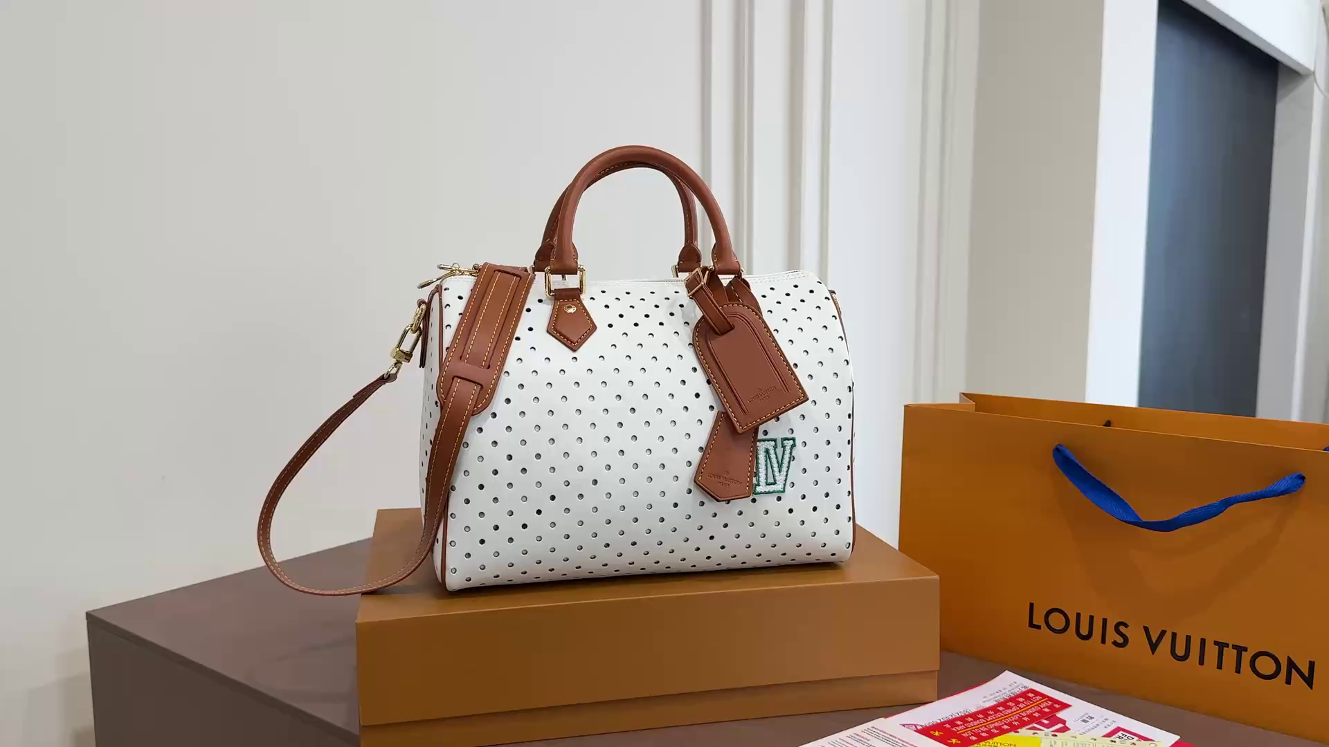 LV Speedy Soft Perforated Leather Top Handle Bag