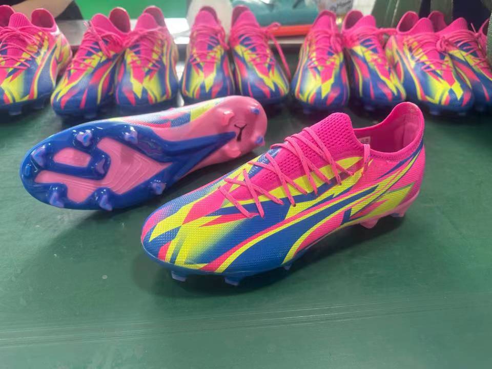 Rose red, blue and yellow football shoes