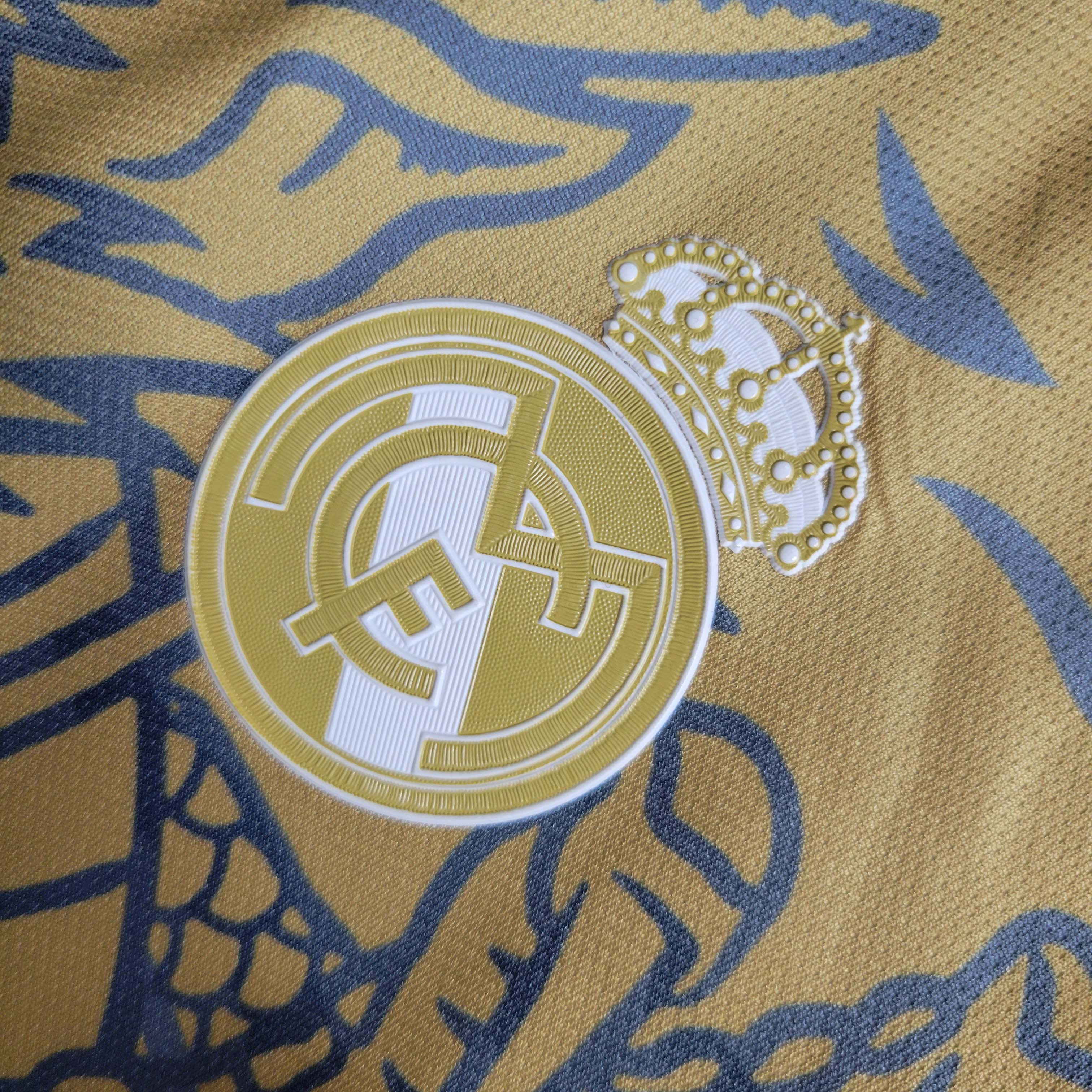 2023/2024 Real Madrid Chinese Gold Dragon Football Shirt-Fans