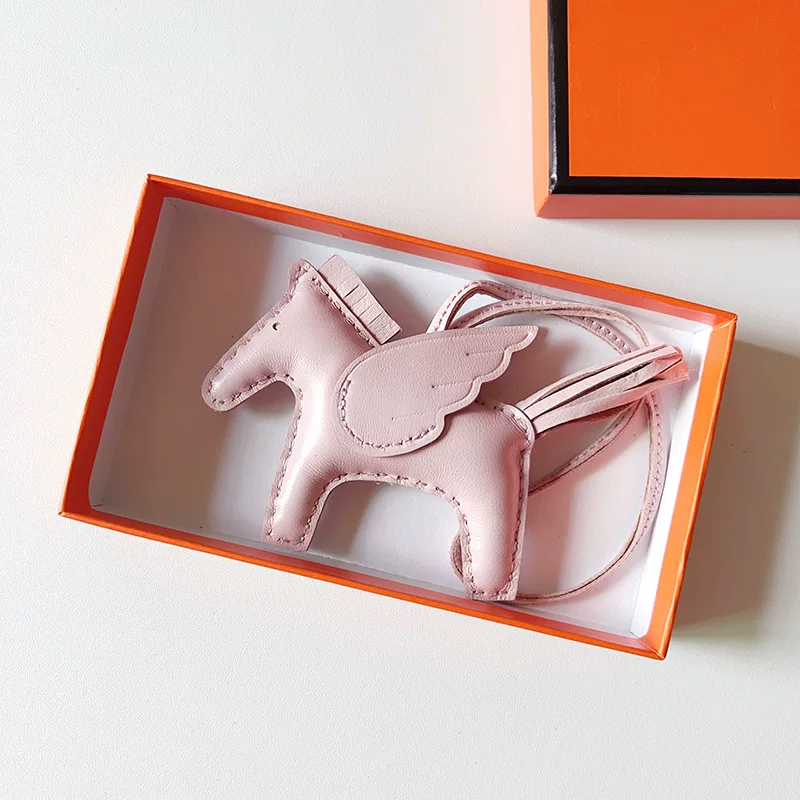 H Hand sewn pony pendant