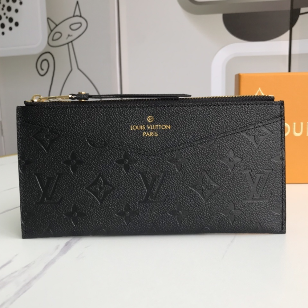 Louis Vuitton Pochette Melanie Monogram Empreinte 9 Inches M68712