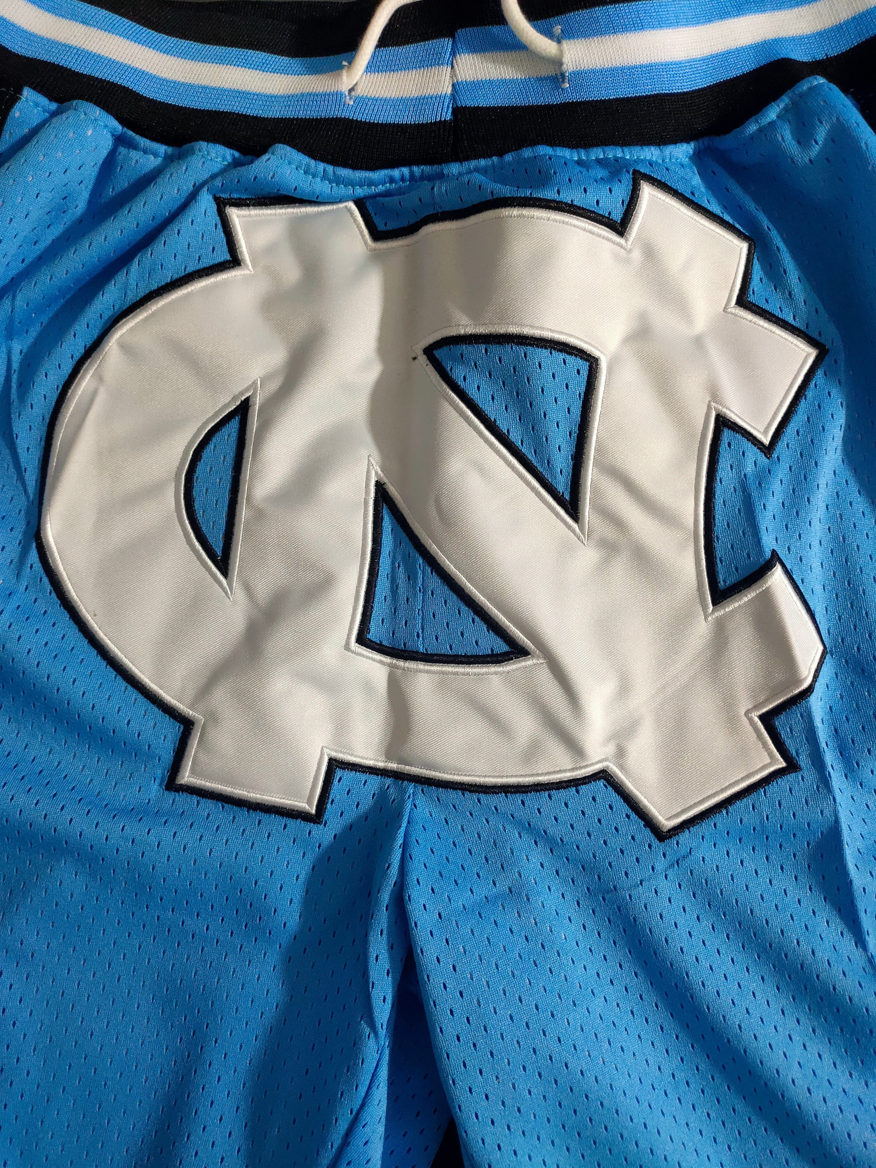 North Carolina JUST DON blue dense embroidery pocket pants
