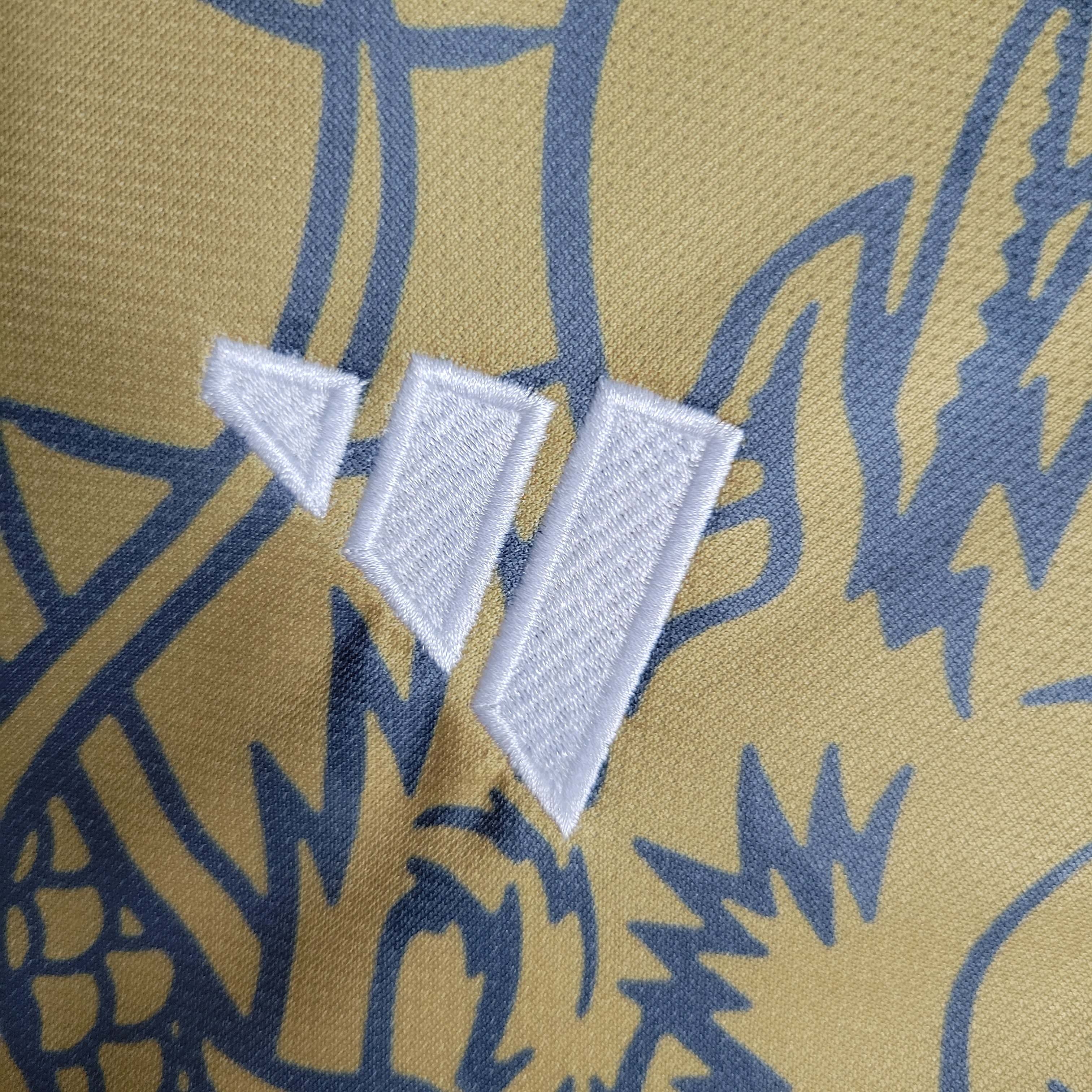 2023/2024 Real Madrid Chinese Gold Dragon Football Shirt-Fans