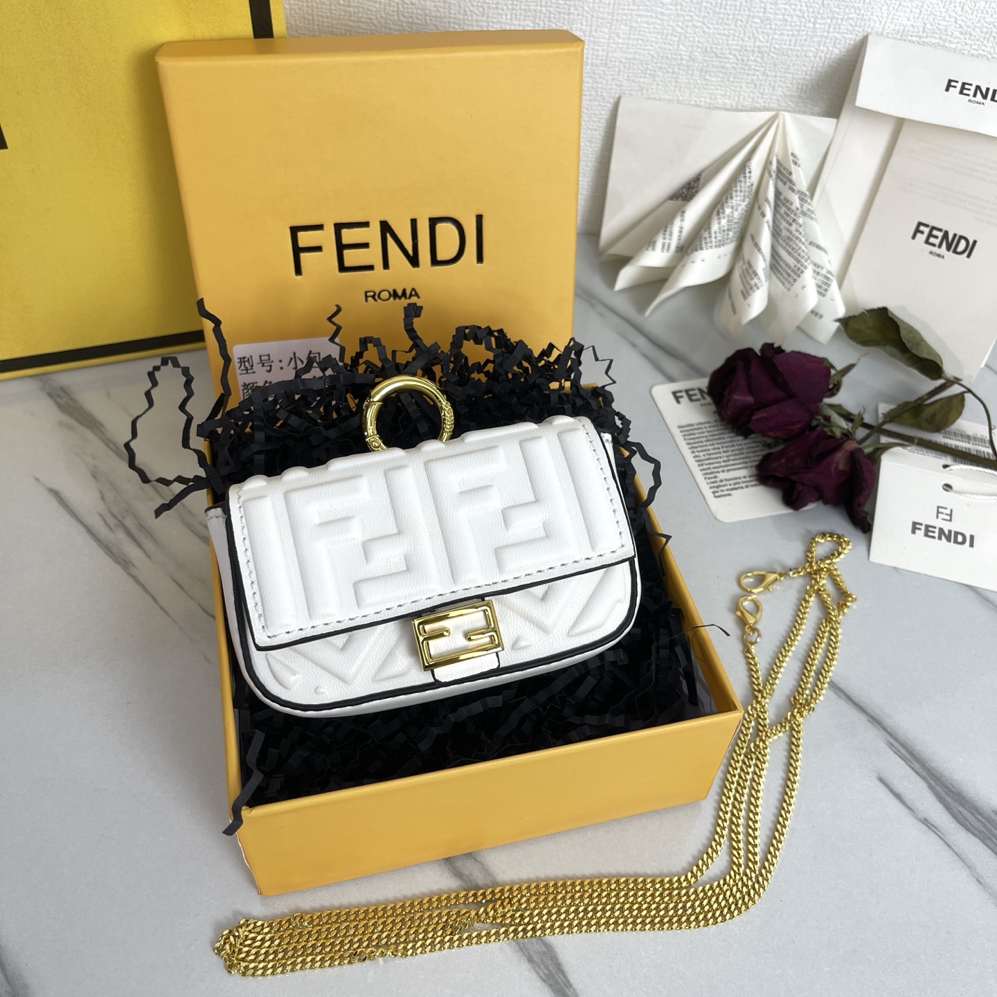 Fendi Nano Baguette FF Embossed Leather Bag