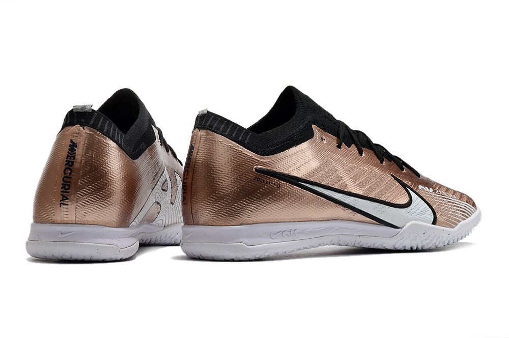 Assassin XV low-top fully knitted waterproof MD air cushion grass spike football shoes