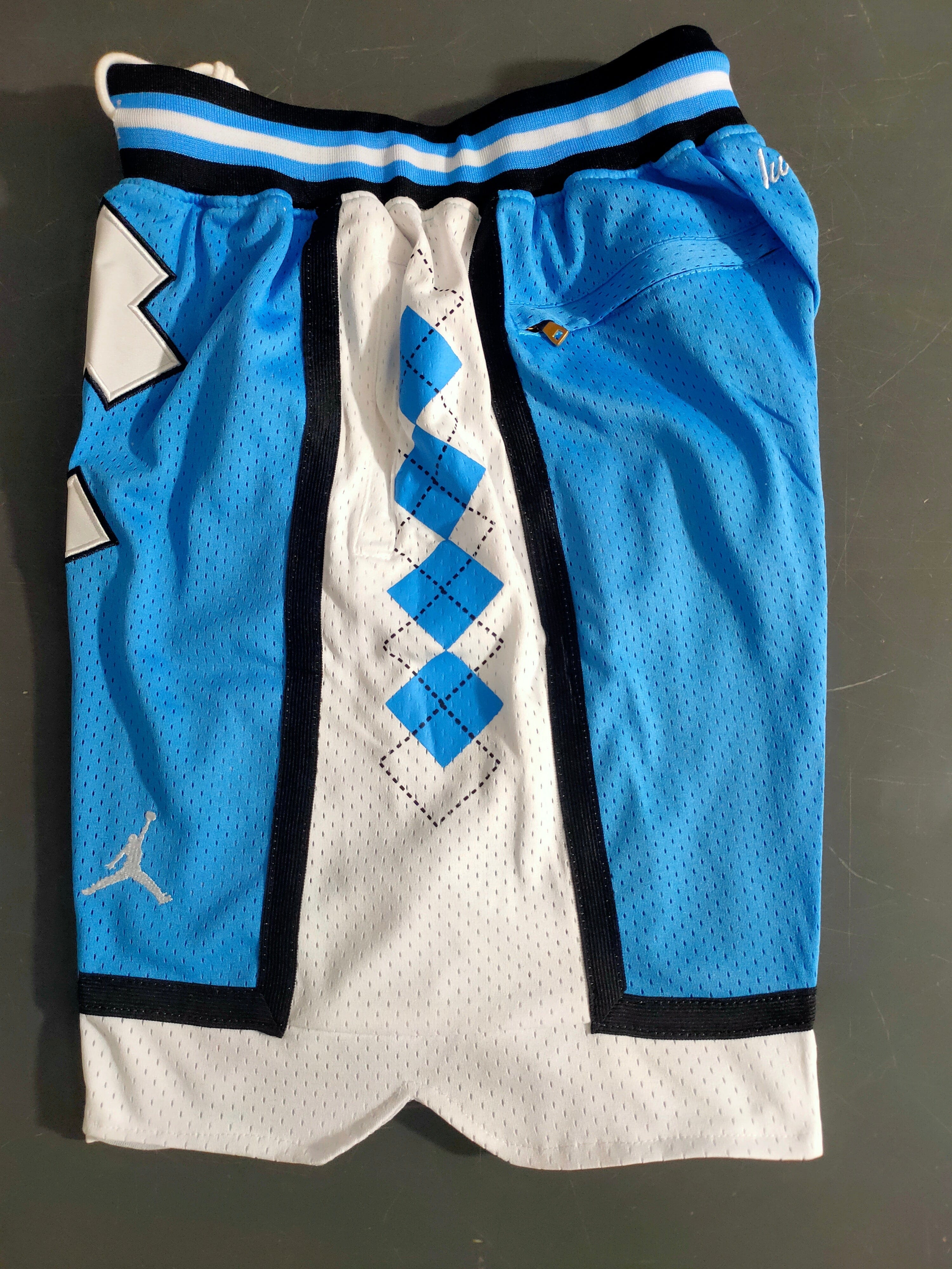 North Carolina JUST DON blue dense embroidery pocket pants