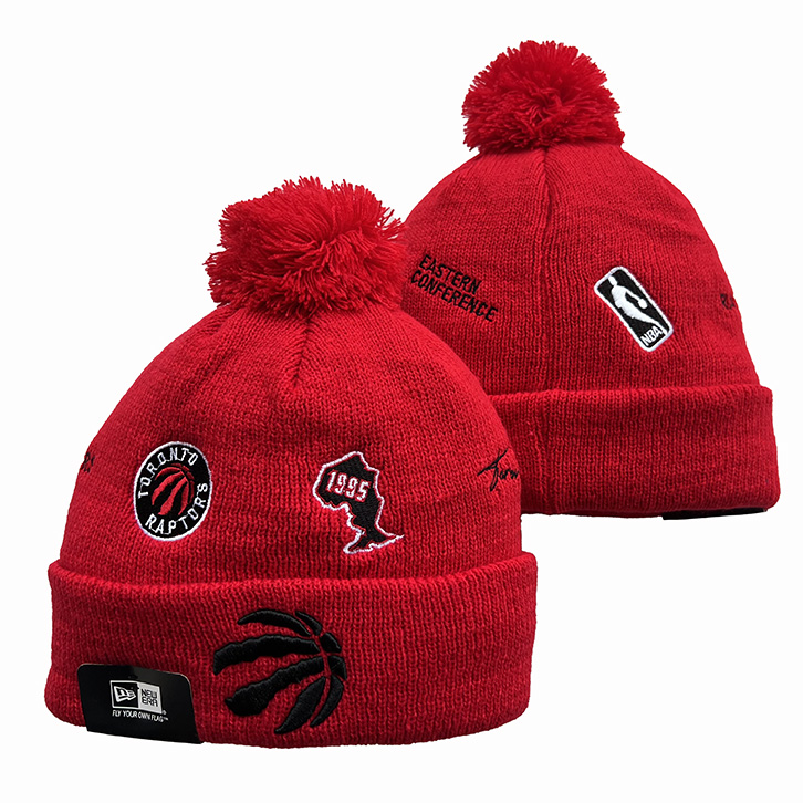 Toronto Raptors New Era Cuffed Knit Hat with Pom