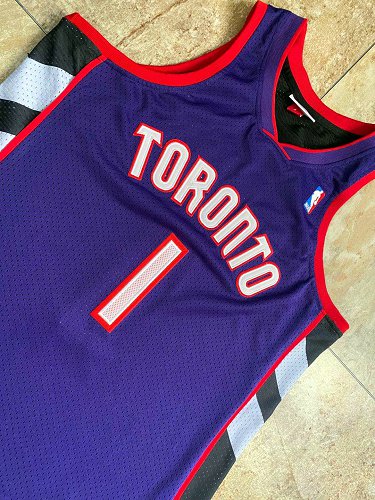 Mitchell &ness McGrady 1999-00 Raptors AU Retro Purple Front and Black Back Jersey