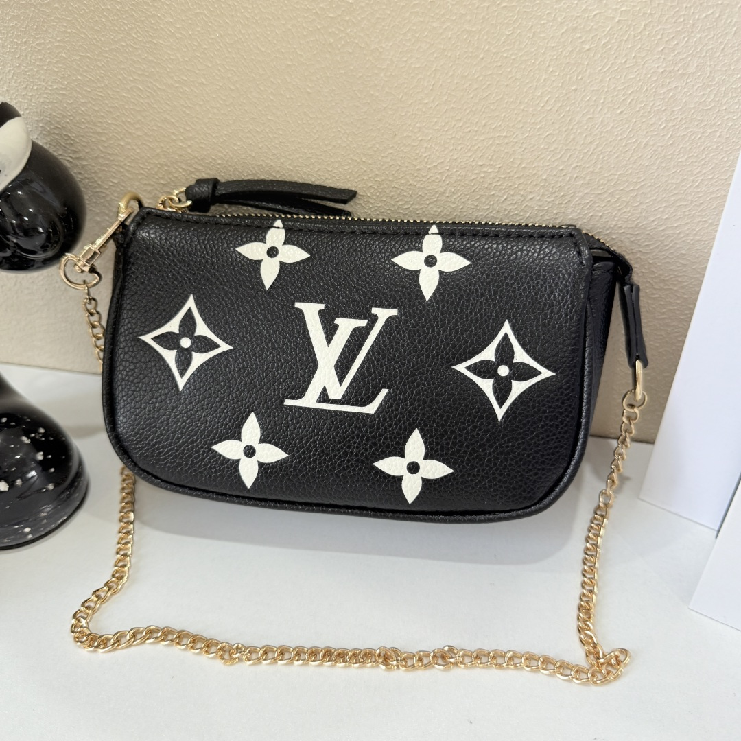 LV Monogram Empreinte Pochette Accessoires Bag