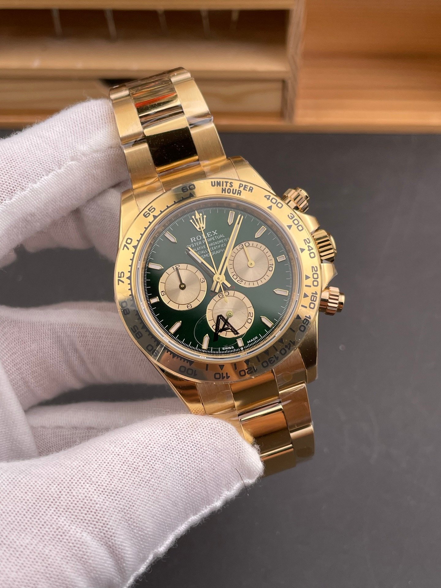 Rolex Daytona Green Gold