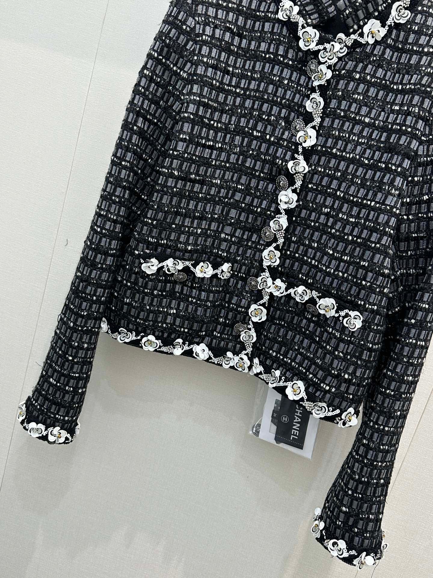 Métiers d'Art collection, heavy sequined tweed jacket