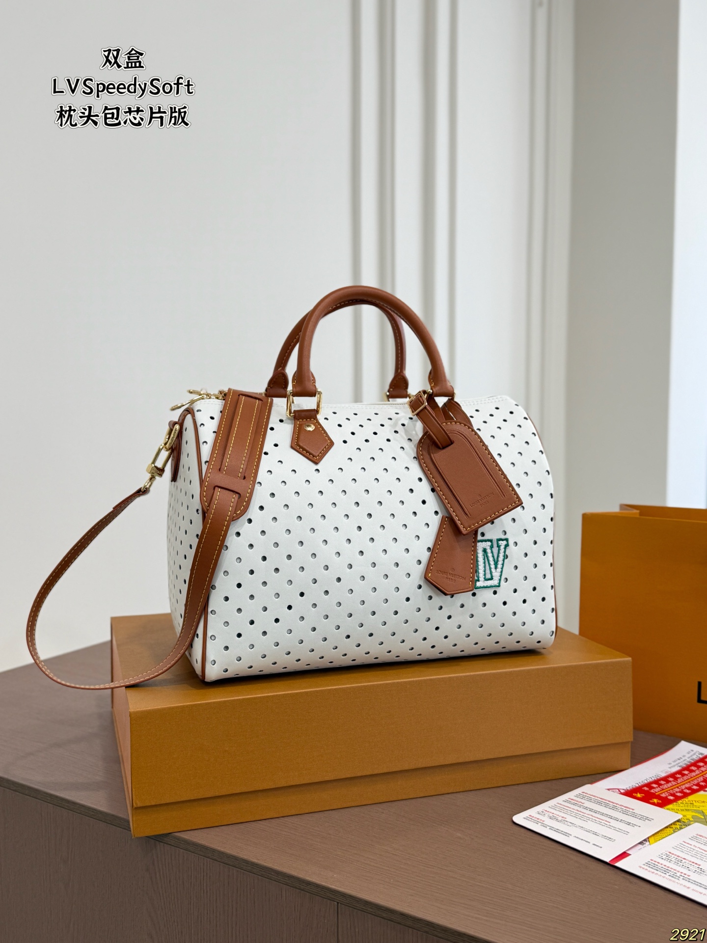 LV Speedy Soft Perforated Leather Top Handle Bag