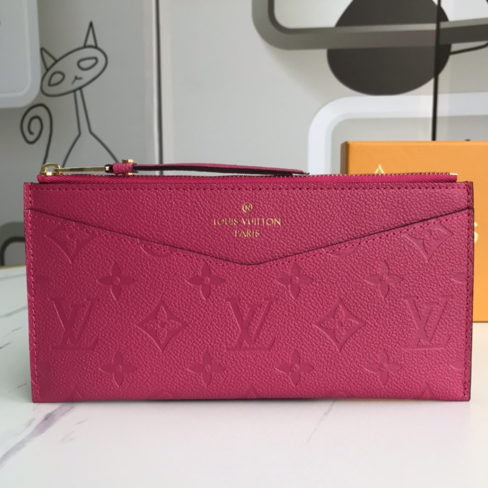 Louis Vuitton Pochette Melanie Monogram Empreinte Fuchsia 9 Inches M68712