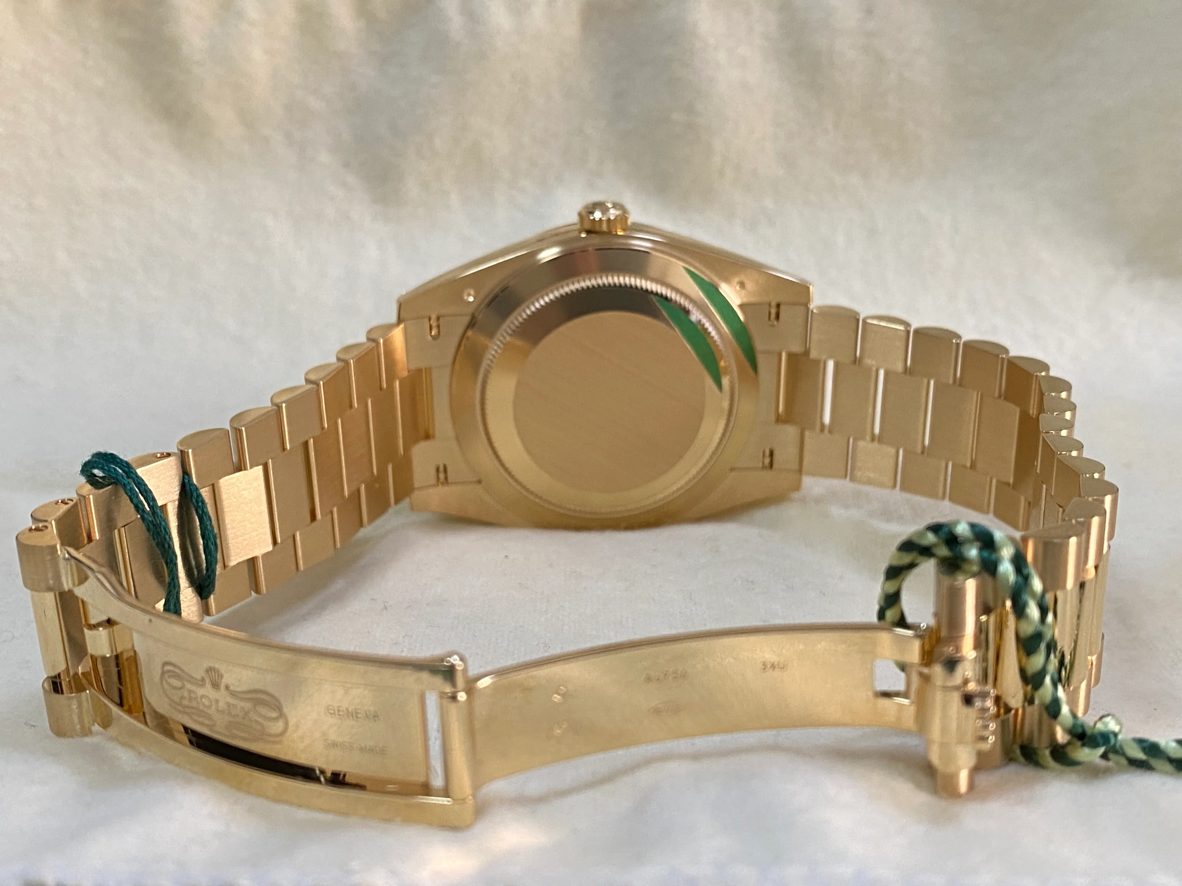 Rolex Yellow Gold Day-Date 40 - 2023 - Fluted Bezel - Black Baguette Diamond Dial - President Bracelet - 228238