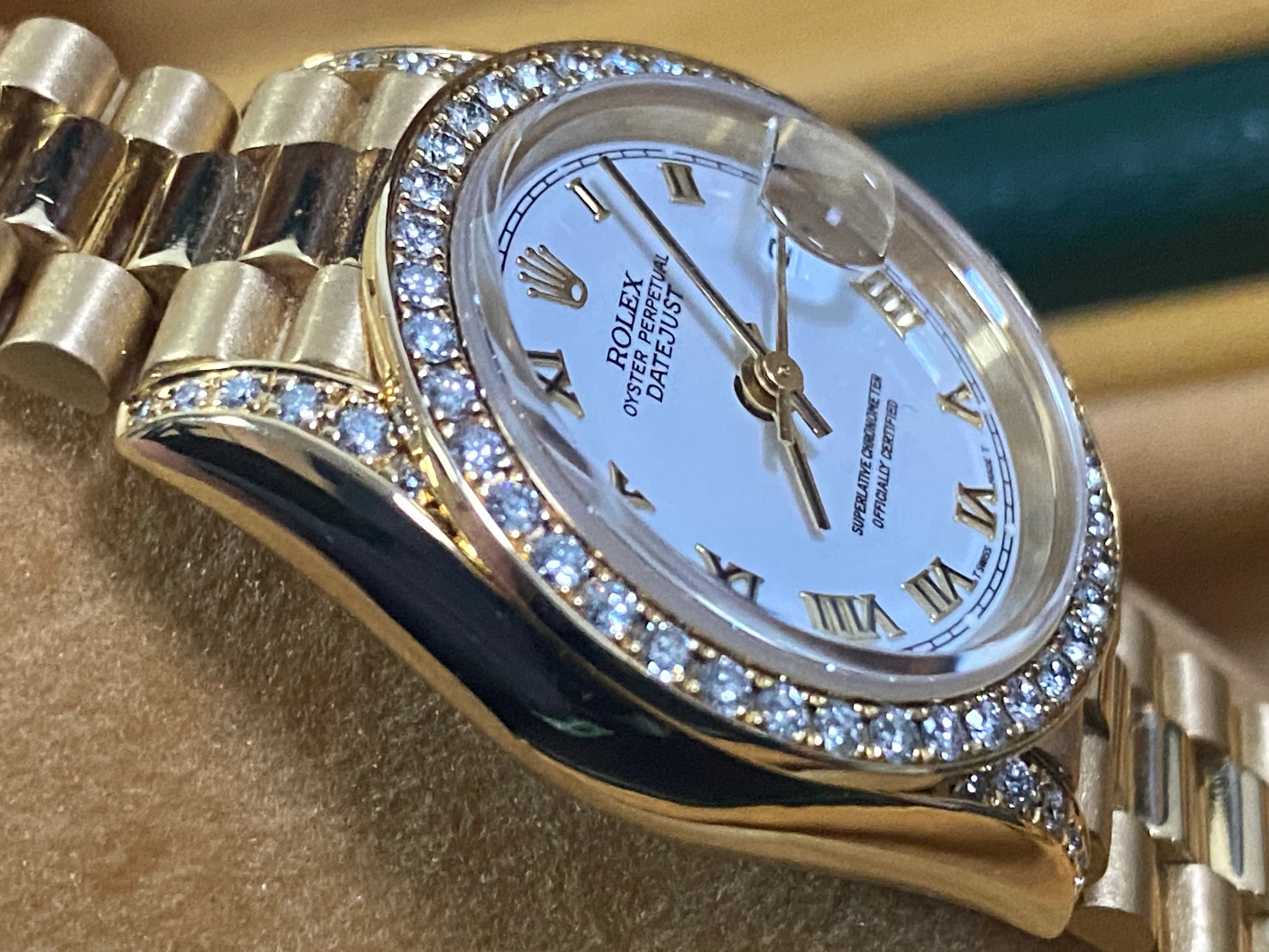 Rolex Yellow Gold Lady-Datejust - 1990 - Diamond Bezel - White Roman Dial - President Bracelet - 69158 