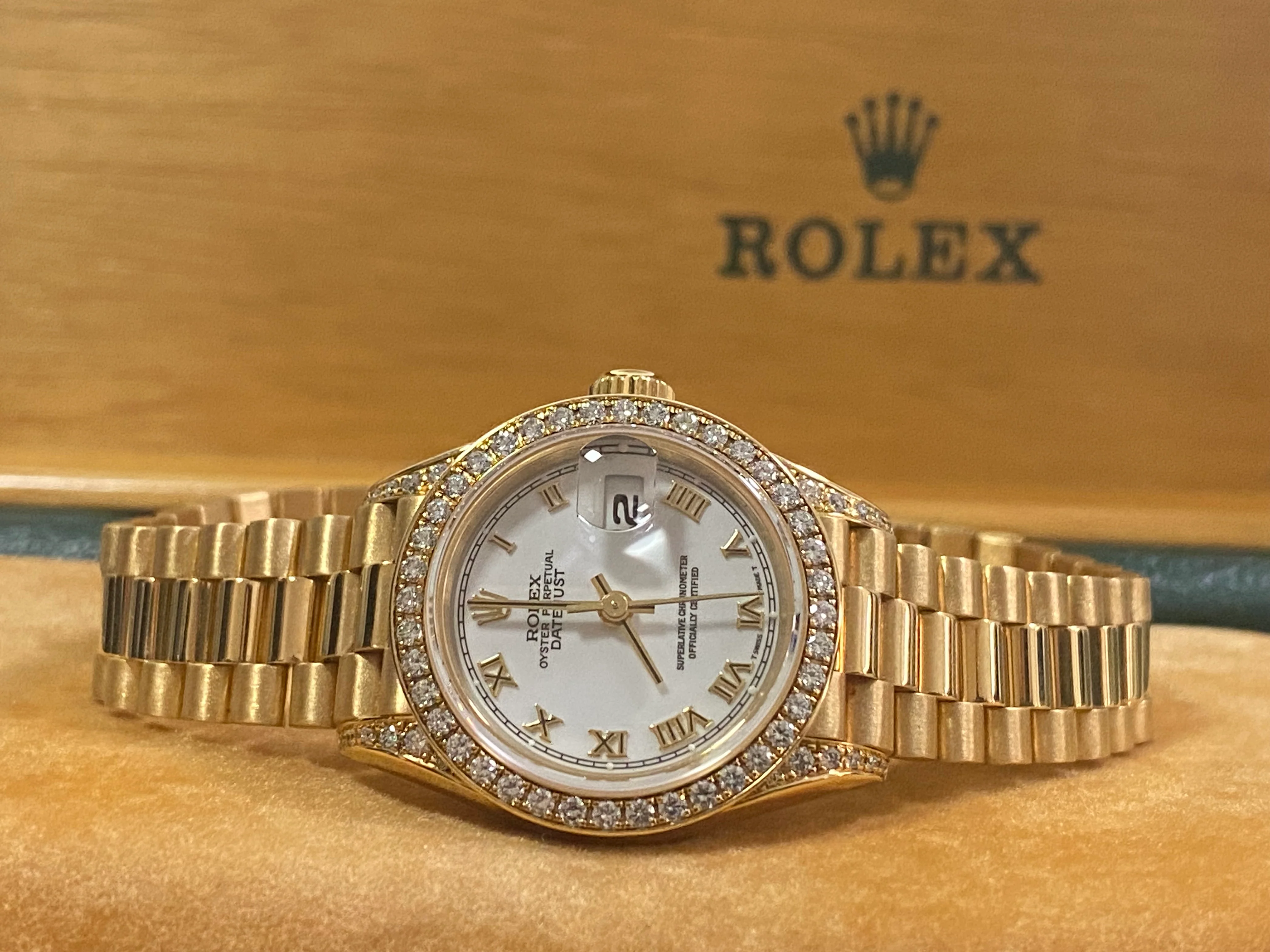 Rolex Yellow Gold Lady-Datejust - 1990 - Diamond Bezel - White Roman Dial - President Bracelet - 69158 