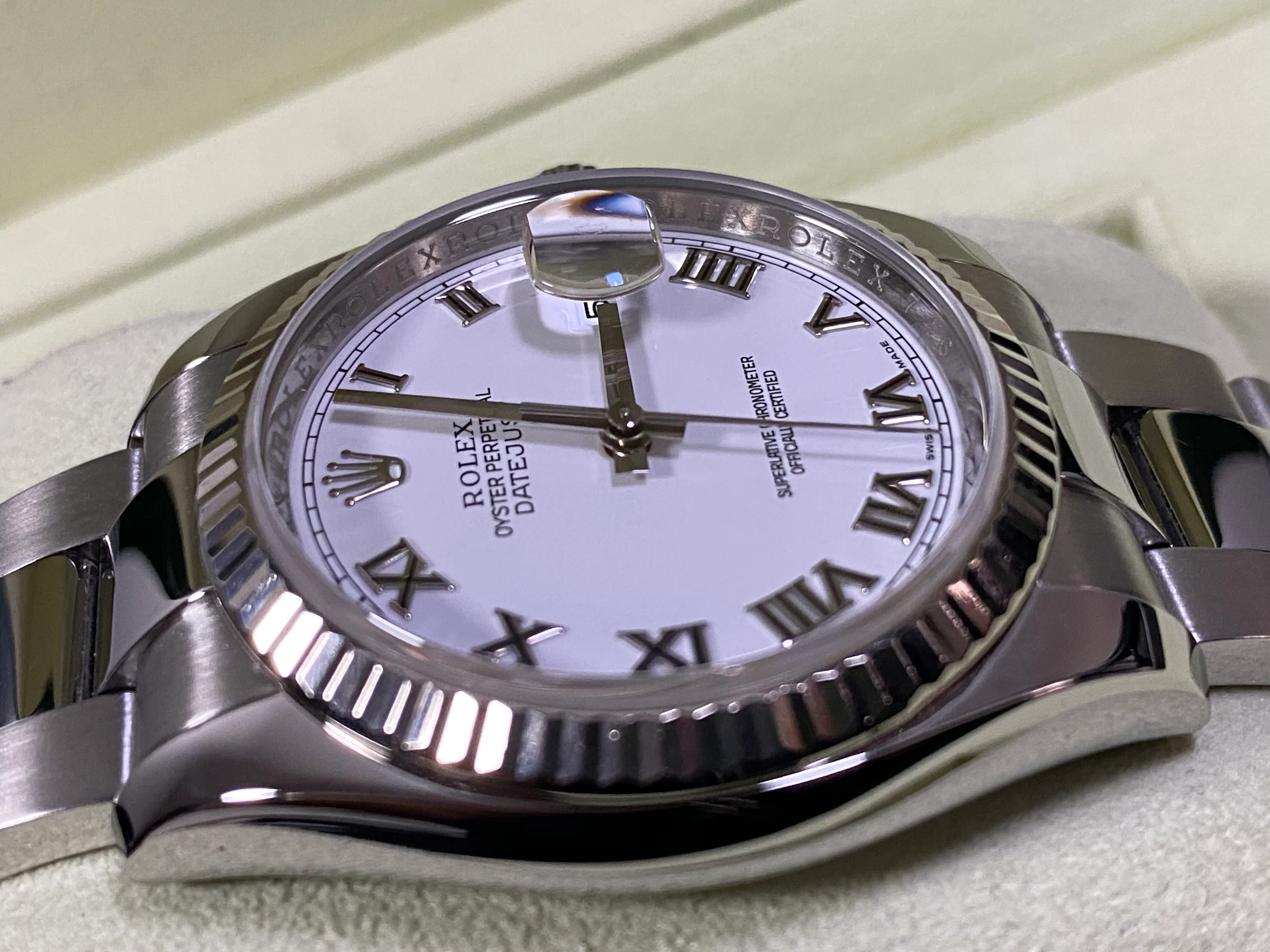 Rolex Steel Datejust 36 - Fluted Bezel - White Roman Dial - Oyster Bracelet - 116234
