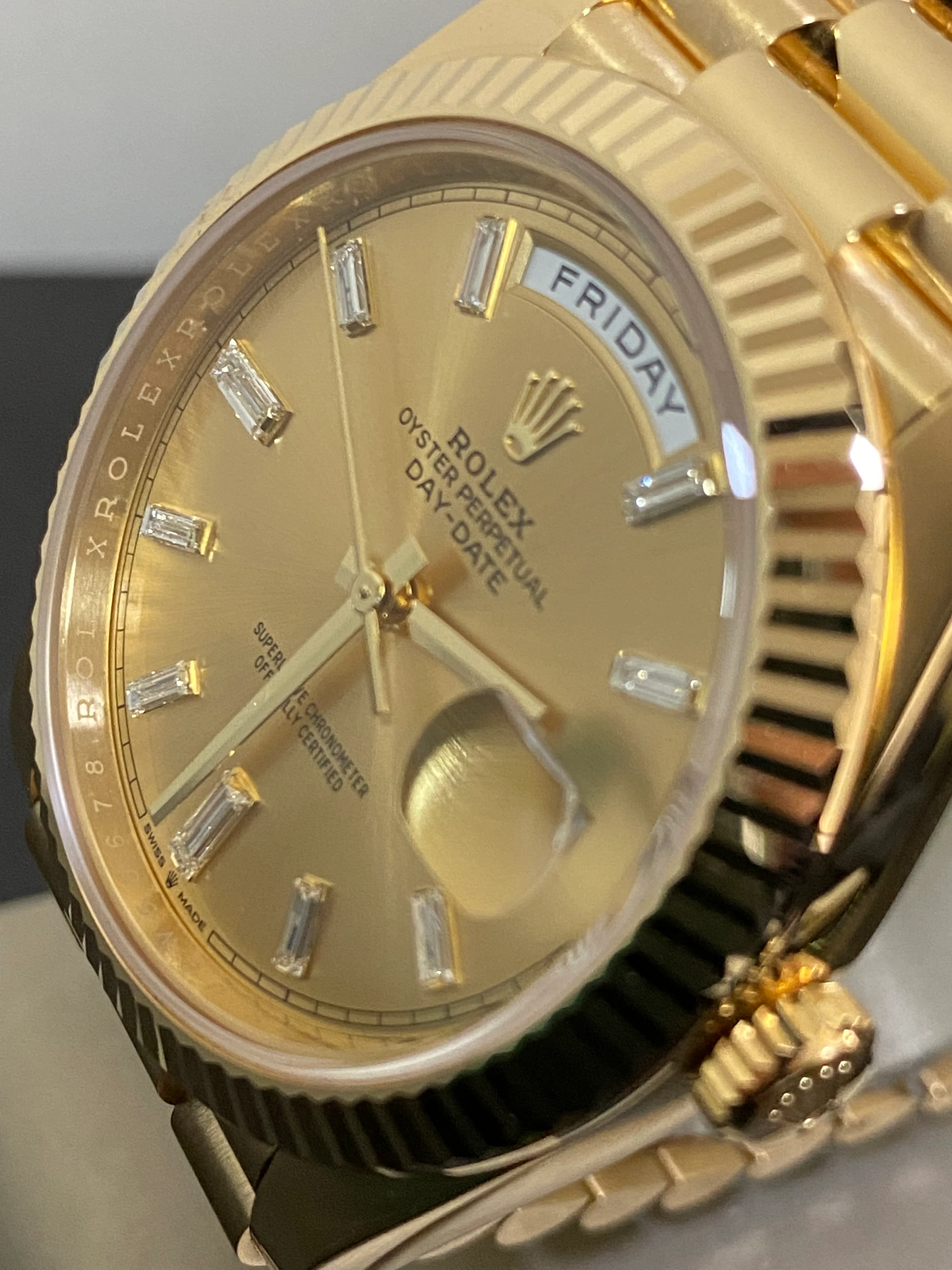 Rolex Yellow Gold Day-Date 40 - 2023 - Fluted Bezel - Baguette Diamond Dial - President Bracelet - 228238