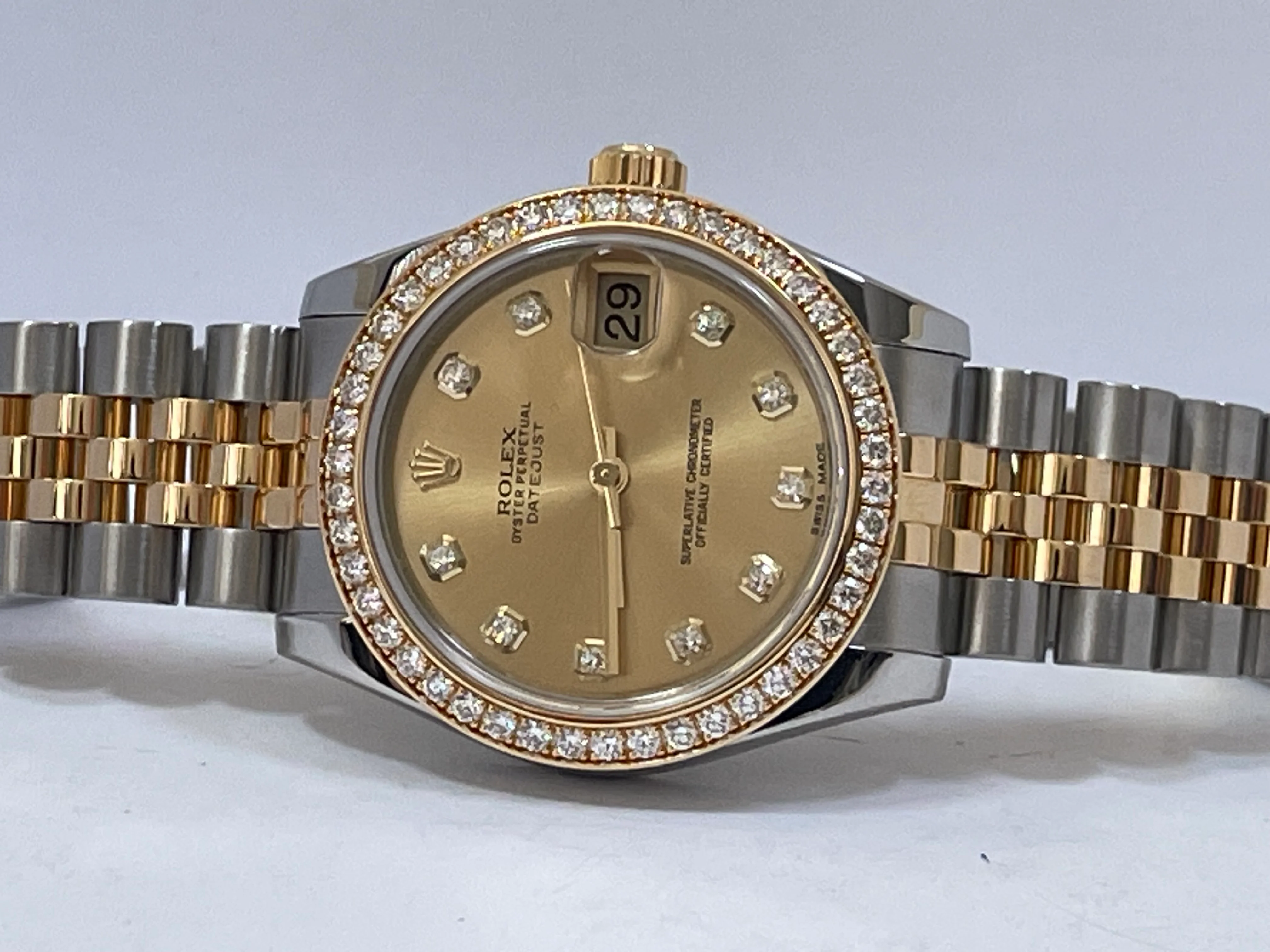 Rolex Steel and Yellow Gold Datejust 31 - G serial - 46 Diamond Bezel - Champagne Diamond Dial - Jubilee Bracelet - 178383