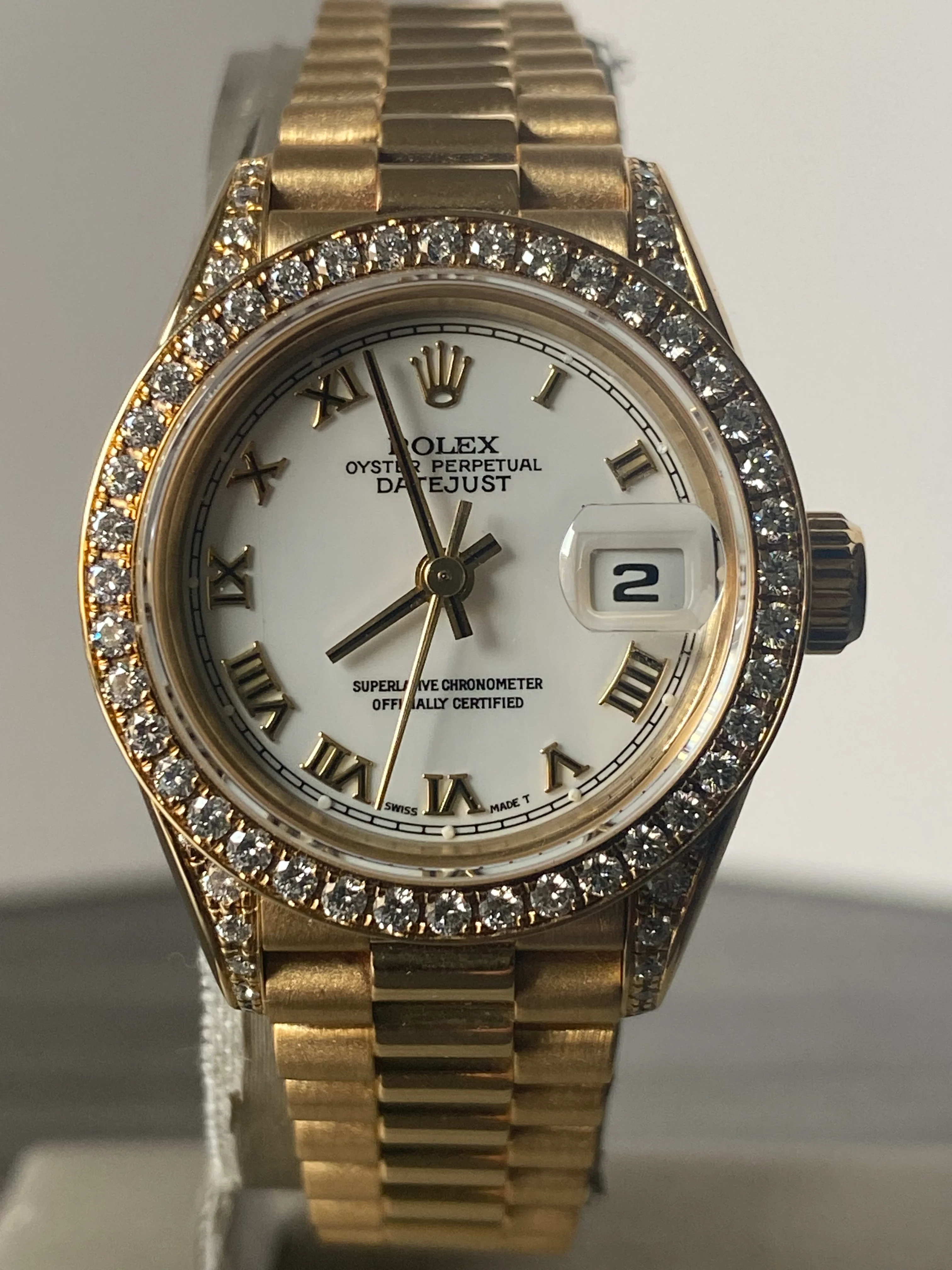 Rolex Yellow Gold Lady-Datejust - 1990 - Diamond Bezel - White Roman Dial - President Bracelet - 69158 
