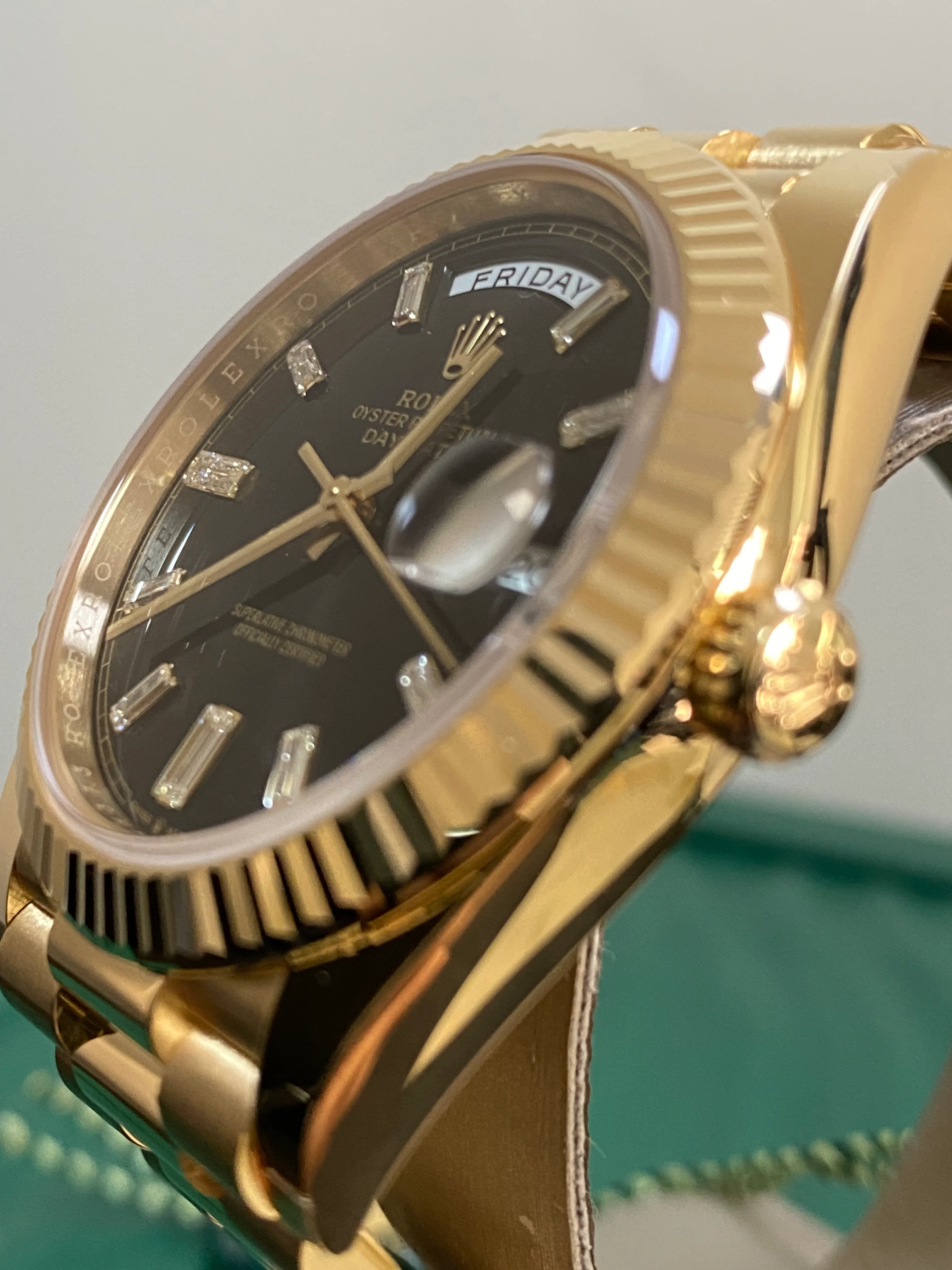 Rolex Yellow Gold Day-Date 40 - 2023 - Fluted Bezel - Black Baguette Diamond Dial - President Bracelet - 228238