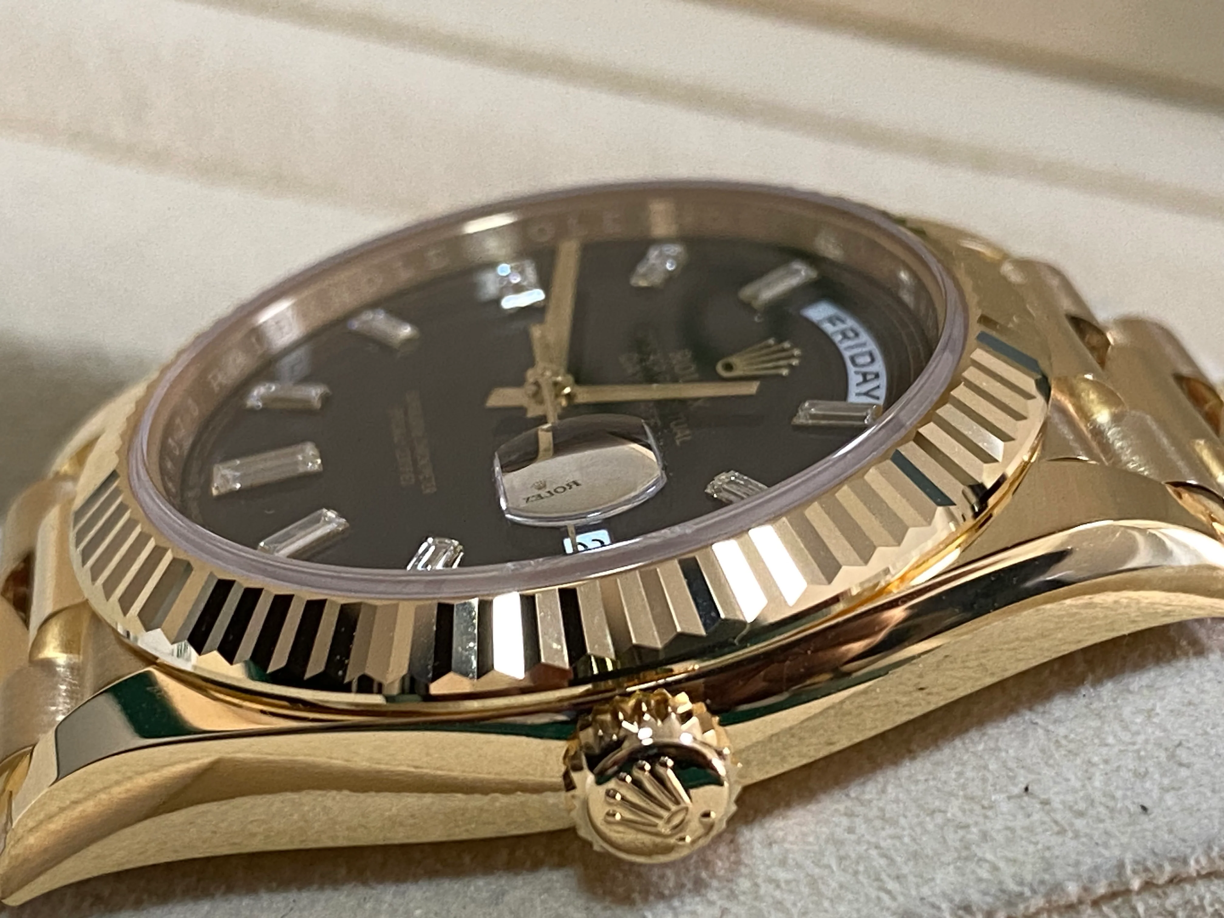 Rolex Yellow Gold Day-Date 40 - 2023 - Fluted Bezel - Black Baguette Diamond Dial - President Bracelet - 228238