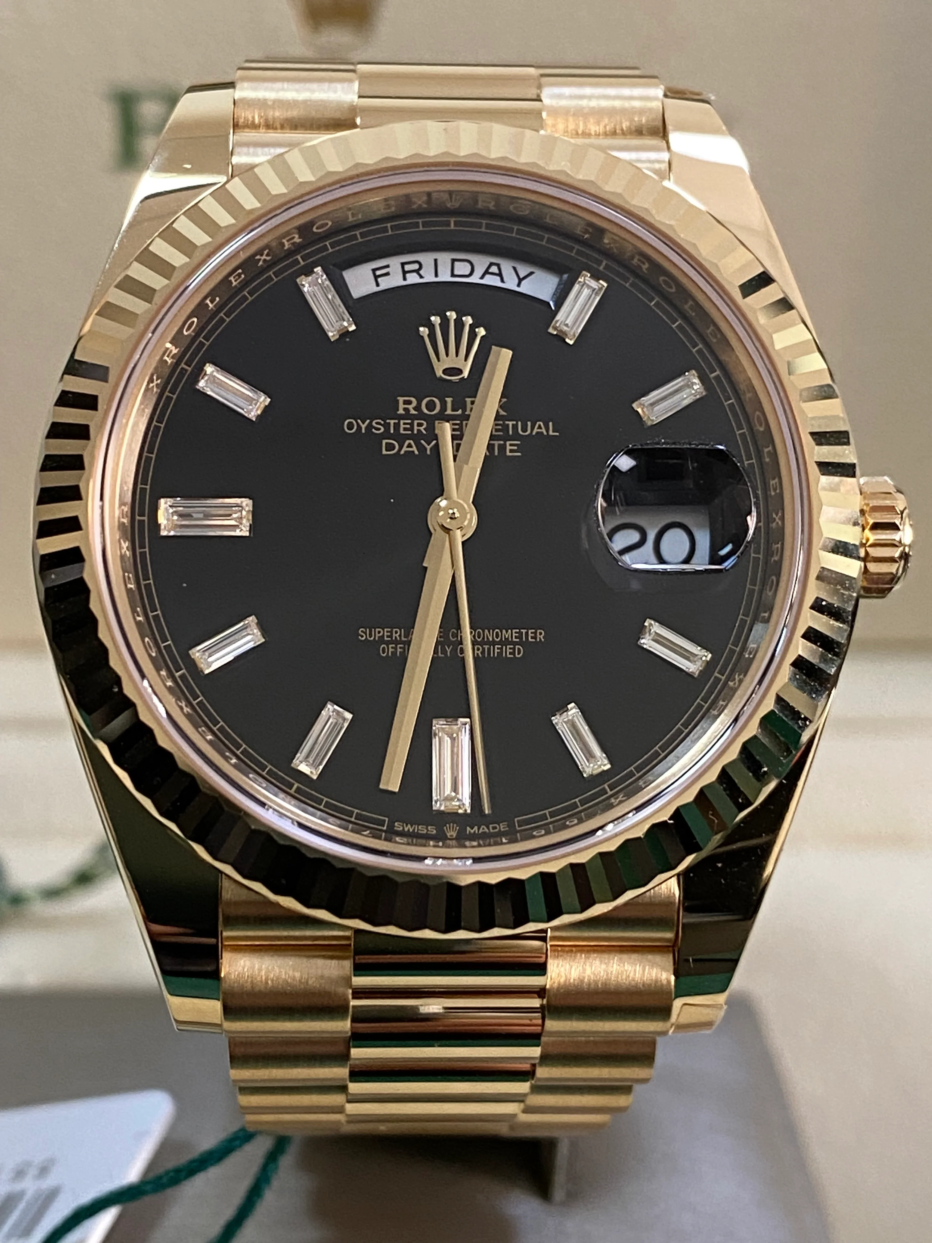 Rolex Yellow Gold Day-Date 40 - 2023 - Fluted Bezel - Black Baguette Diamond Dial - President Bracelet - 228238