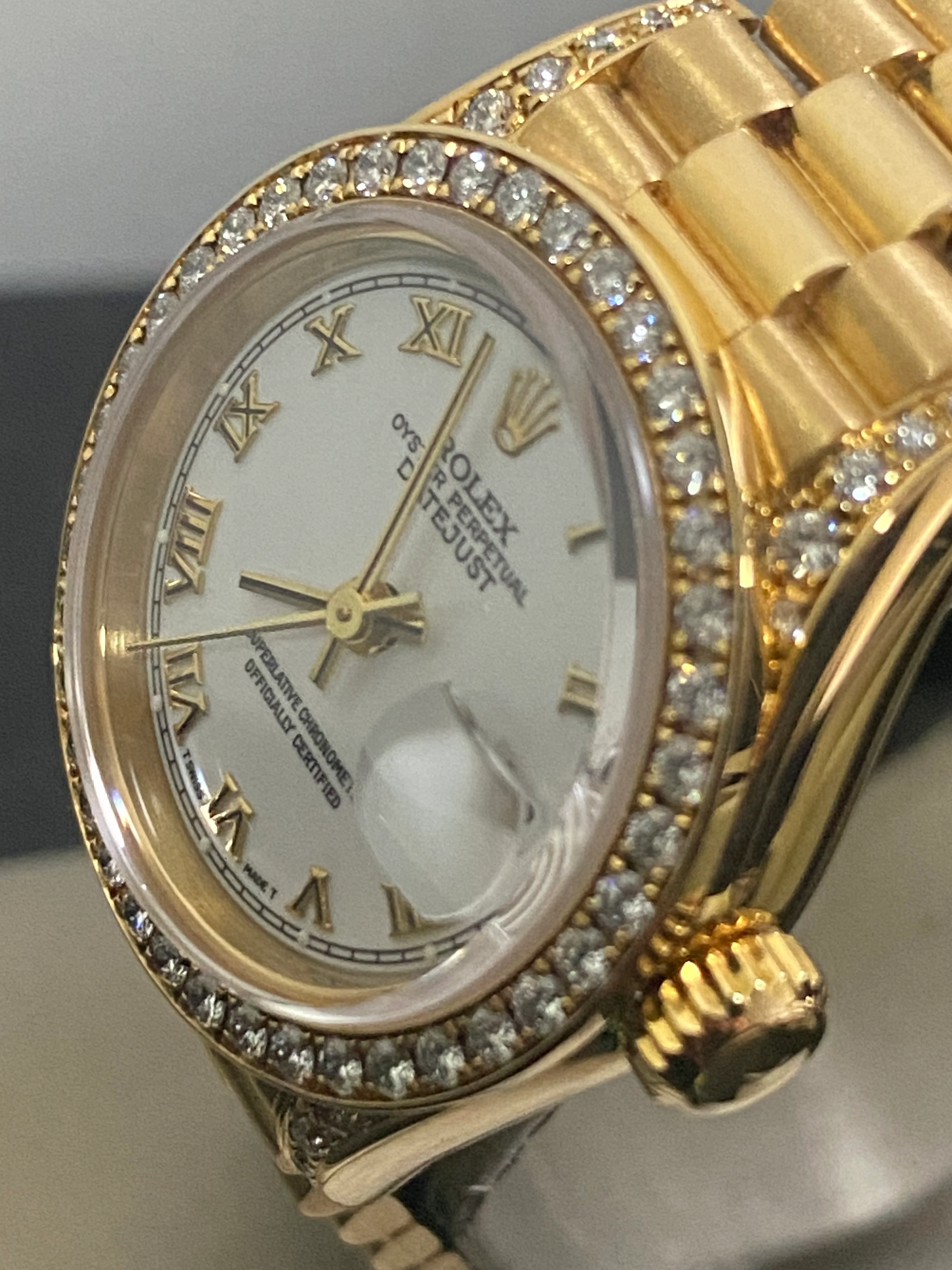 Rolex Yellow Gold Lady-Datejust - 1990 - Diamond Bezel - White Roman Dial - President Bracelet - 69158 
