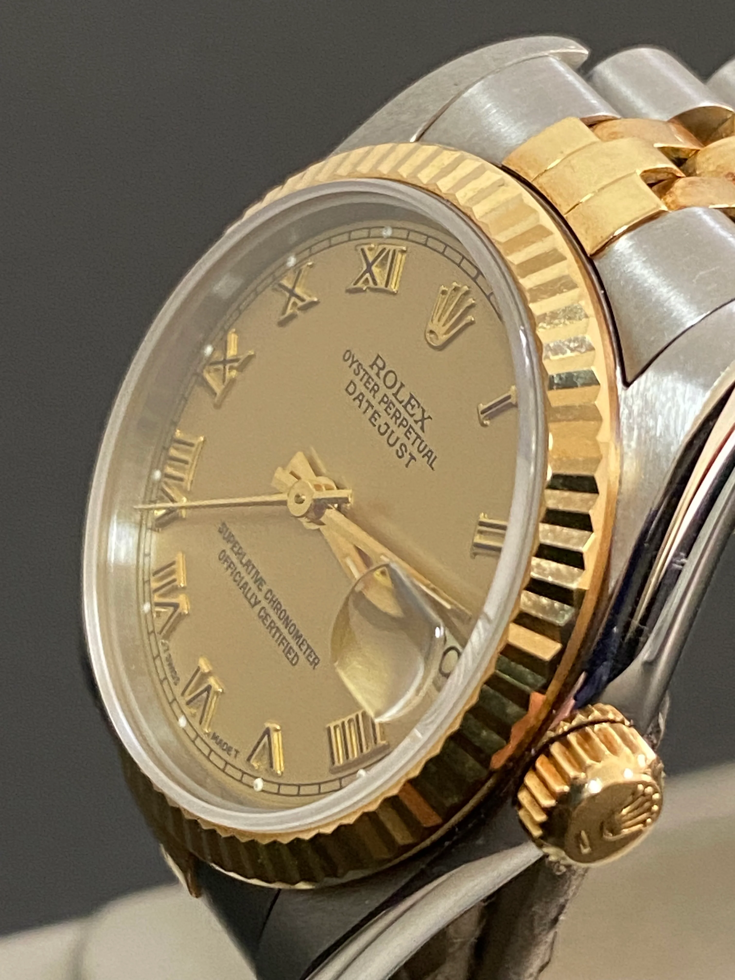 Rolex Steel and Yellow Gold Datejust 31 - S Serial - Fluted Bezel - Champagne Roman Dial - Jubilee Bracelet - 68273