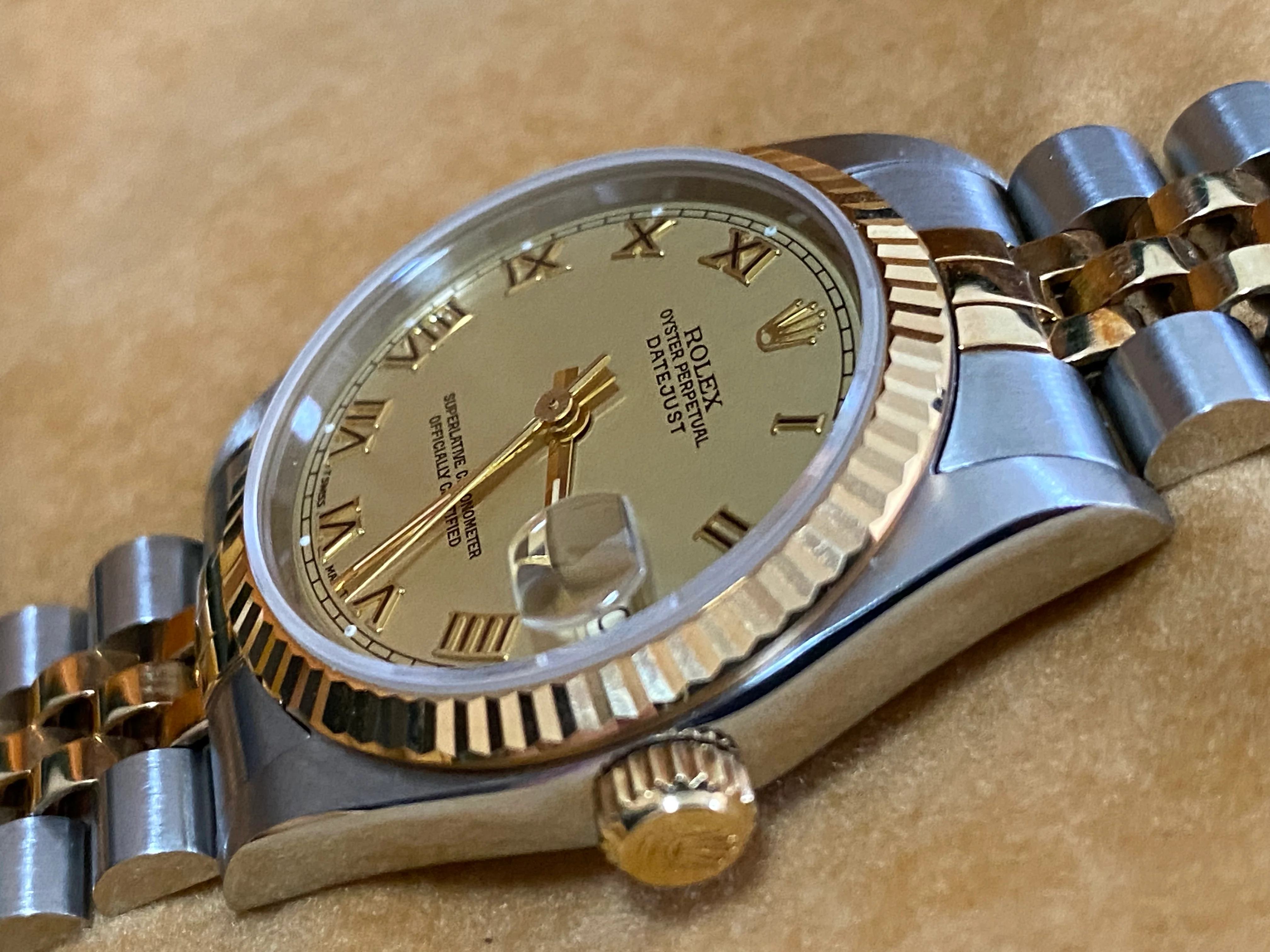 Rolex Steel and Yellow Gold Datejust 31 - S Serial - Fluted Bezel - Champagne Roman Dial - Jubilee Bracelet - 68273