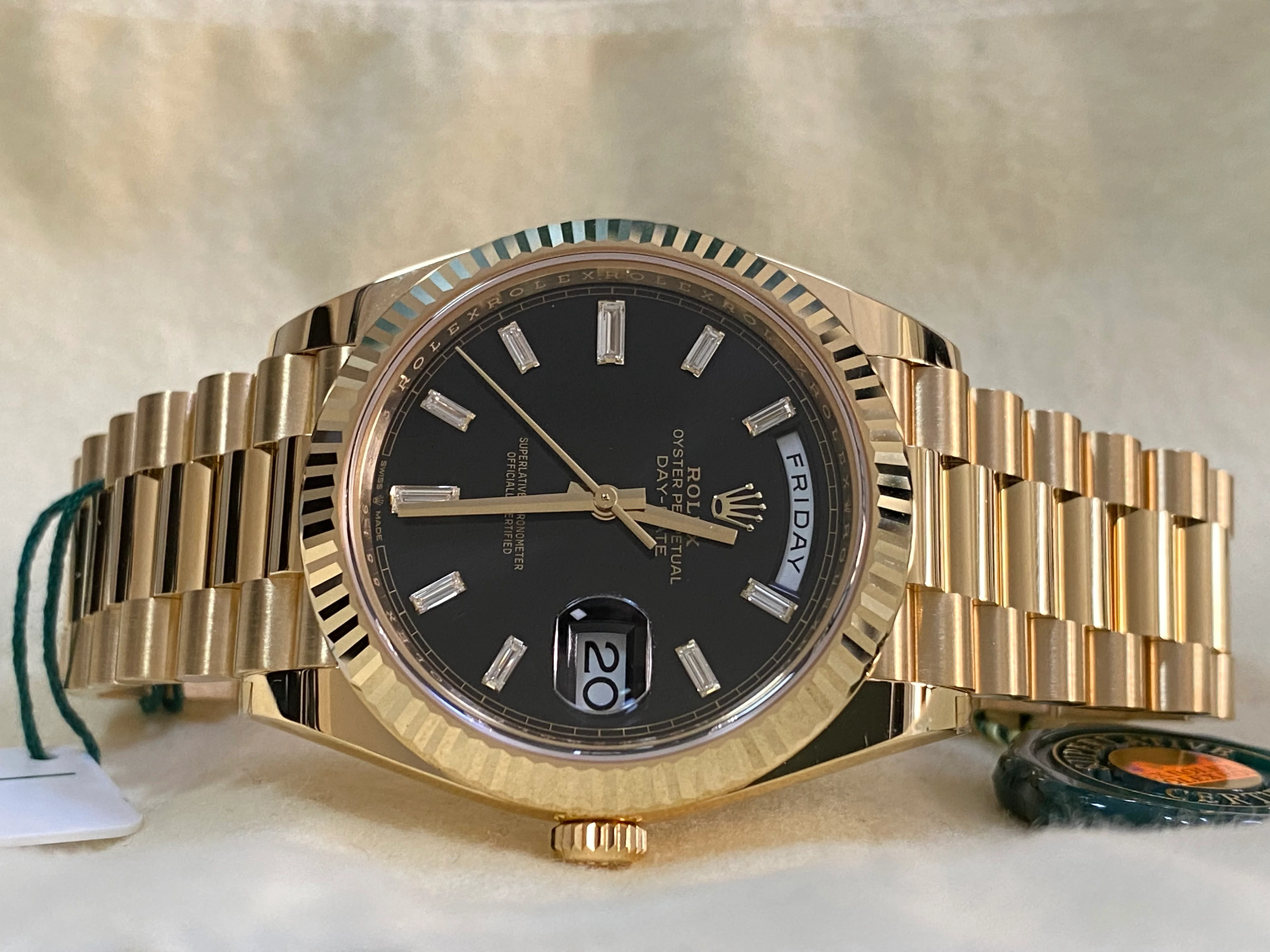 Rolex Yellow Gold Day-Date 40 - 2023 - Fluted Bezel - Black Baguette Diamond Dial - President Bracelet - 228238
