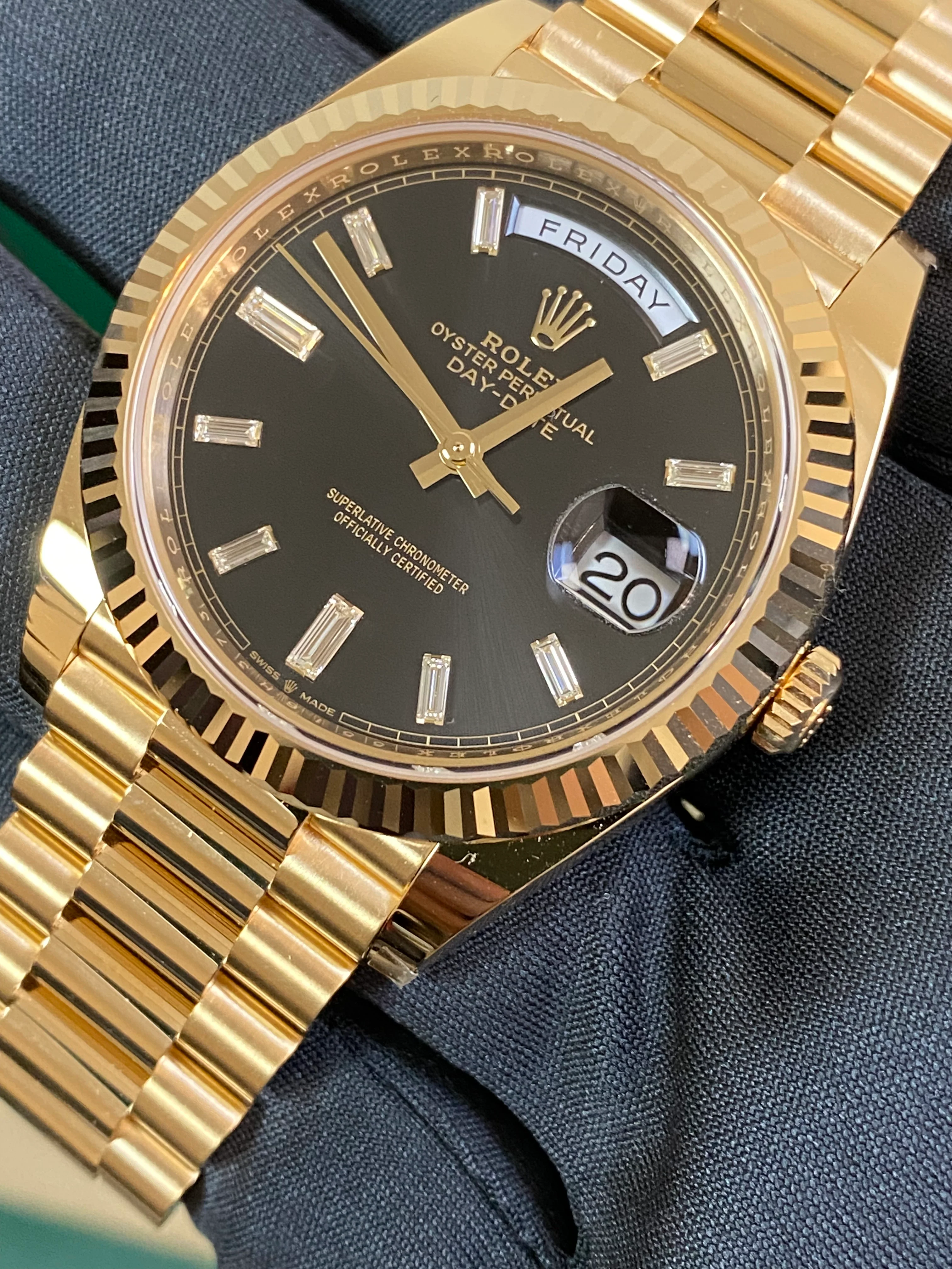 Rolex Yellow Gold Day-Date 40 - 2023 - Fluted Bezel - Black Baguette Diamond Dial - President Bracelet - 228238