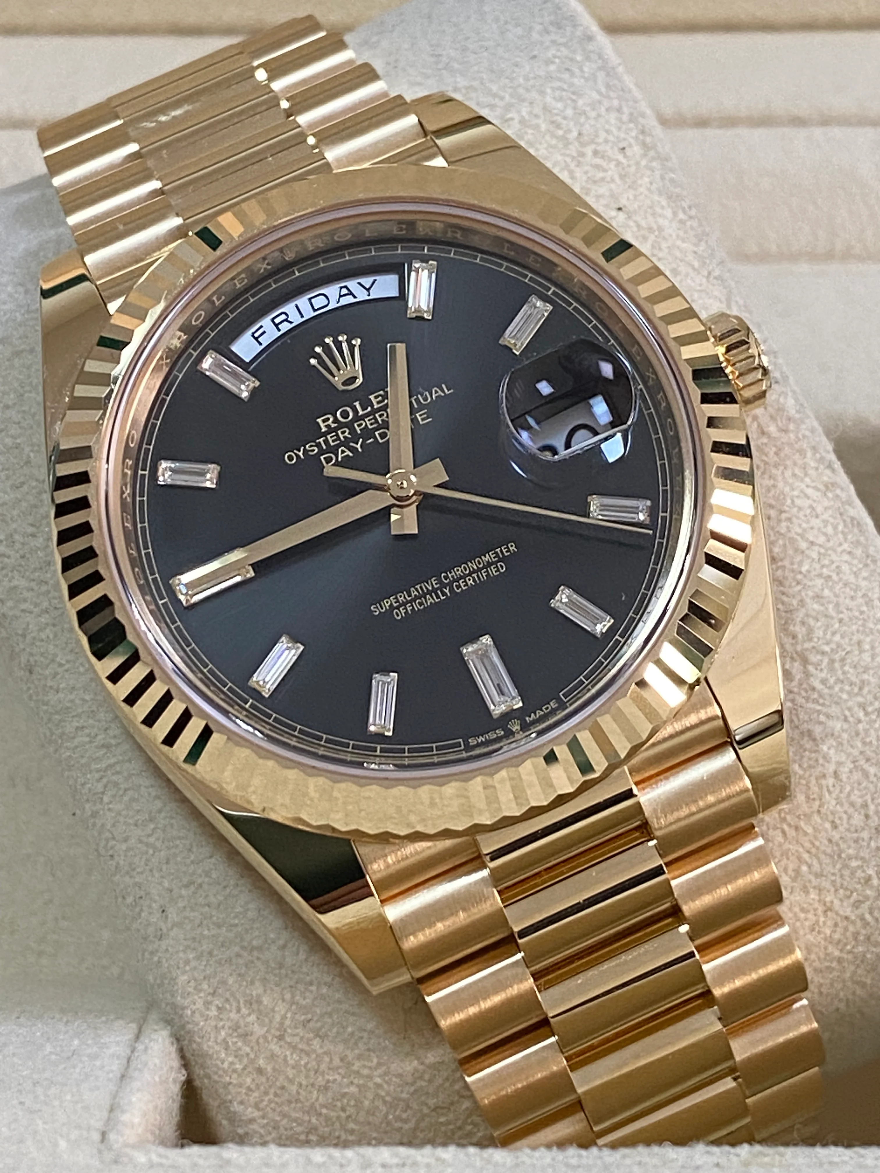 Rolex Yellow Gold Day-Date 40 - 2023 - Fluted Bezel - Black Baguette Diamond Dial - President Bracelet - 228238