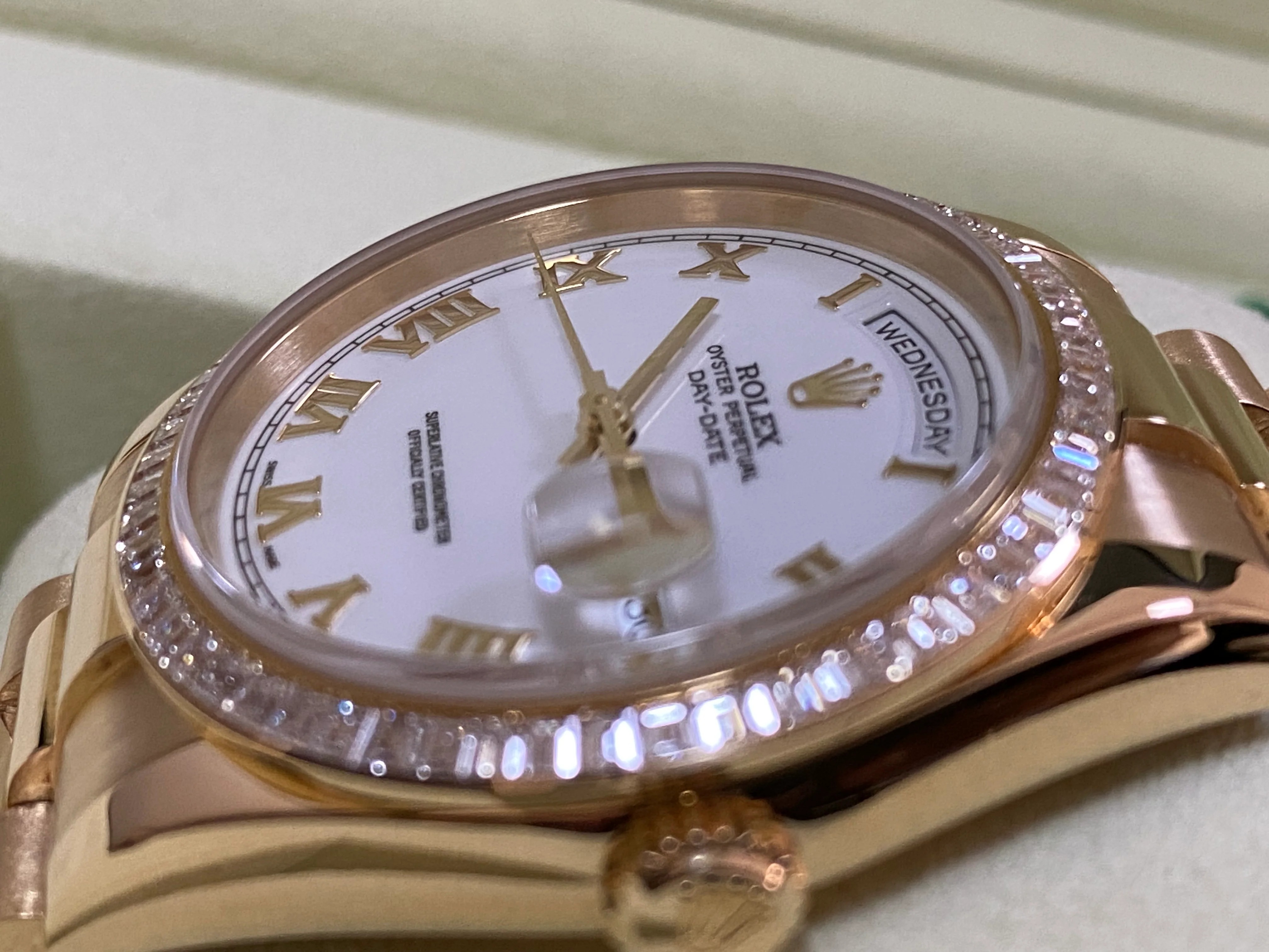 Rolex Yellow Gold Day-Date 36 - P Serial - Baguette Diamond Bezel - White Roman Dial - President Bracelet - 118398BR