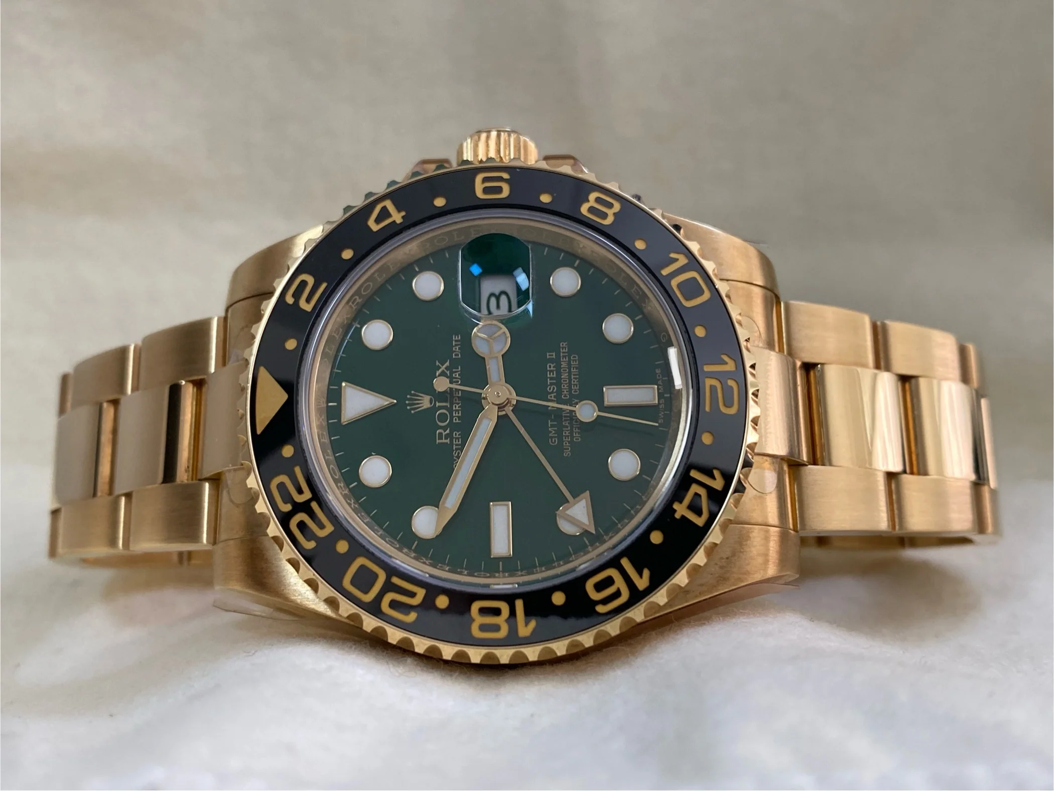 Rolex Yellow Gold GMT-Master II - G serial - Black Bezel - Anniversary Green Dial - Oyster Bracelet - 116718LN *FULL STICKERS*