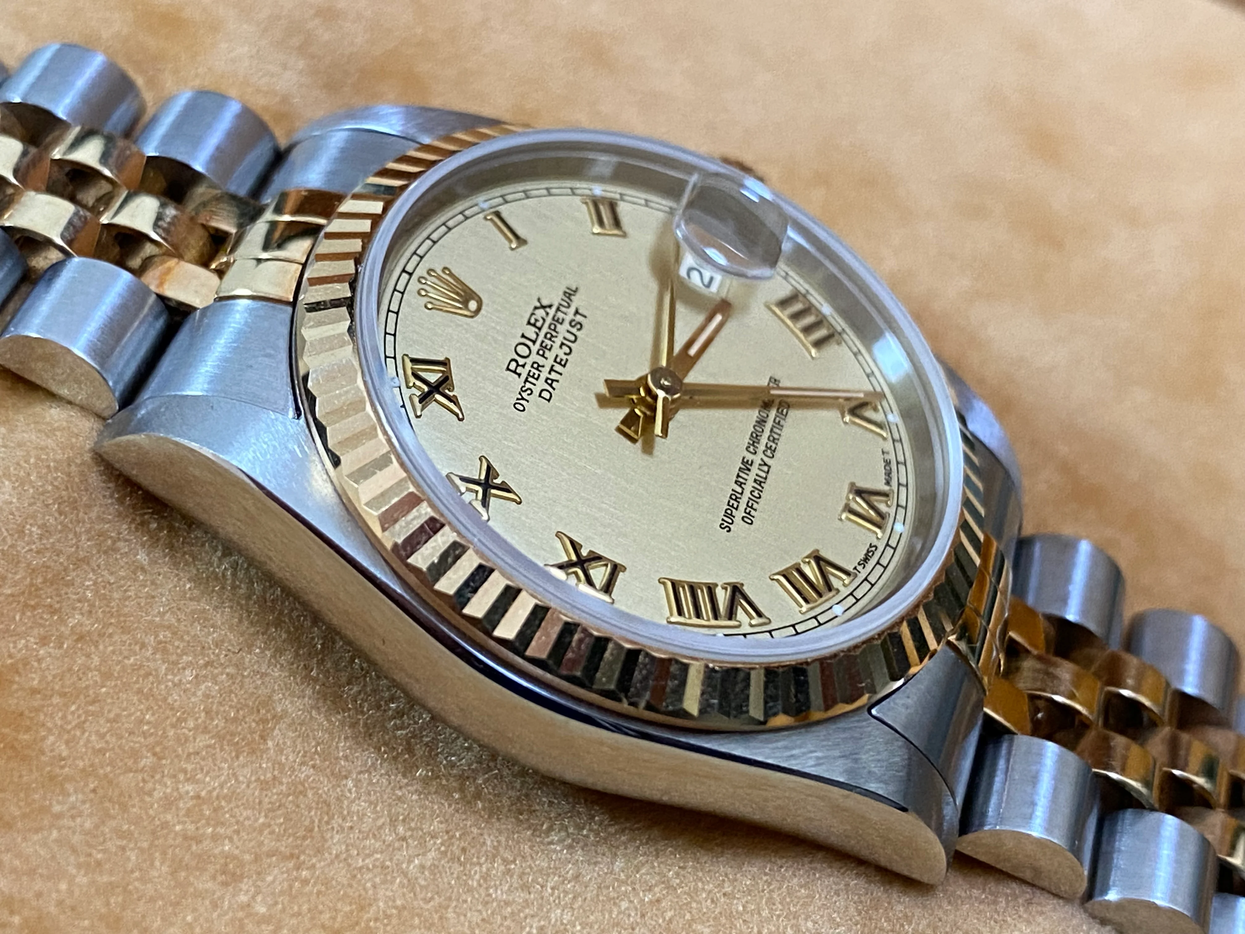 Rolex Steel and Yellow Gold Datejust 31 - S Serial - Fluted Bezel - Champagne Roman Dial - Jubilee Bracelet - 68273