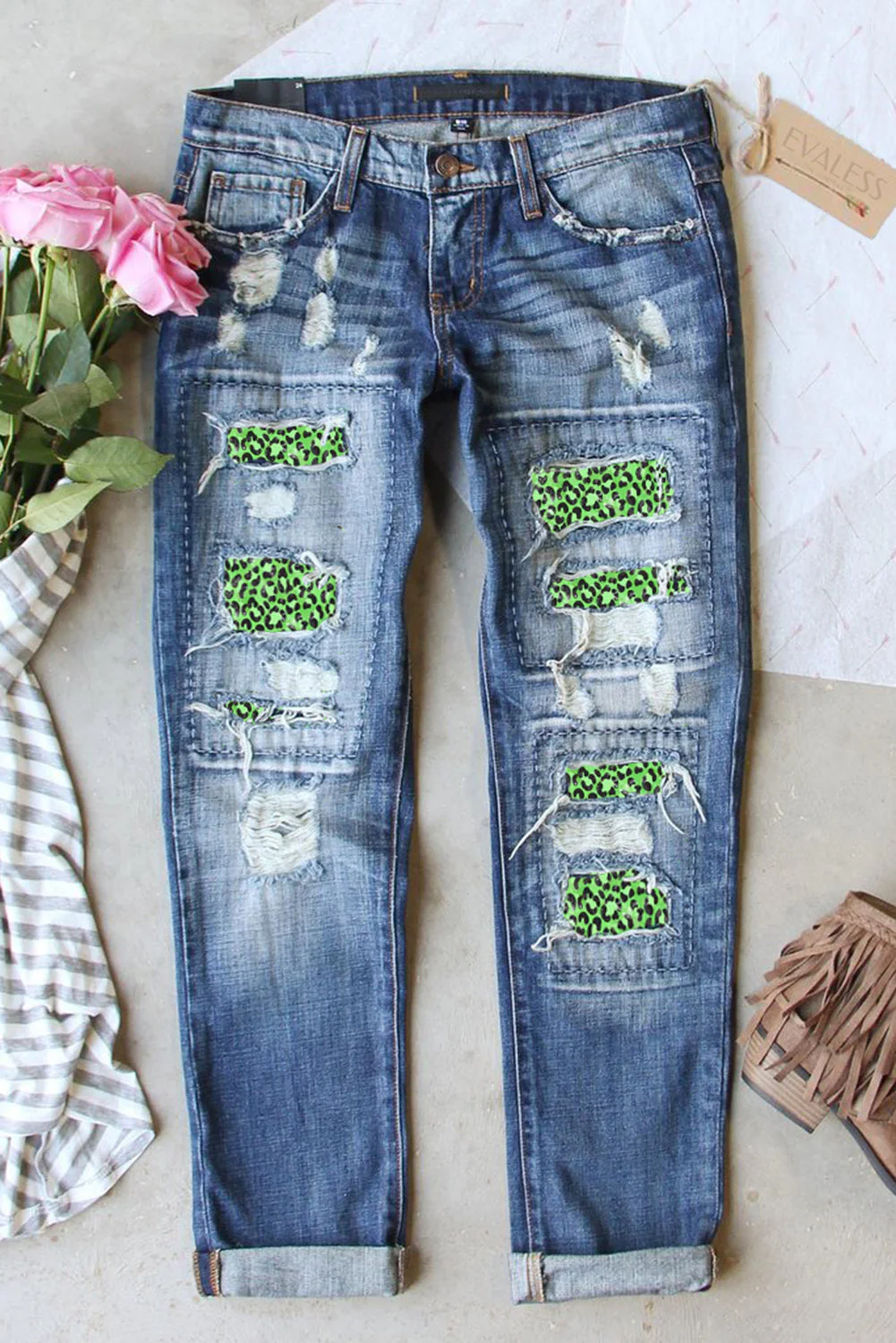Leopard Clover Ripped Jeans。