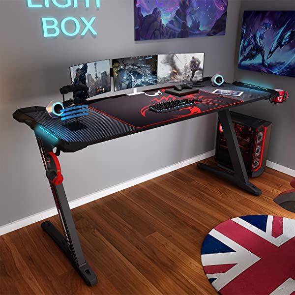 DESIGNA Gaming Desk with LED Lights, 60 inch Computer Gaming Desk Z-Shaped with Mouse Pad, Handle Rack, Cup Holder, Headphone Hook, Black