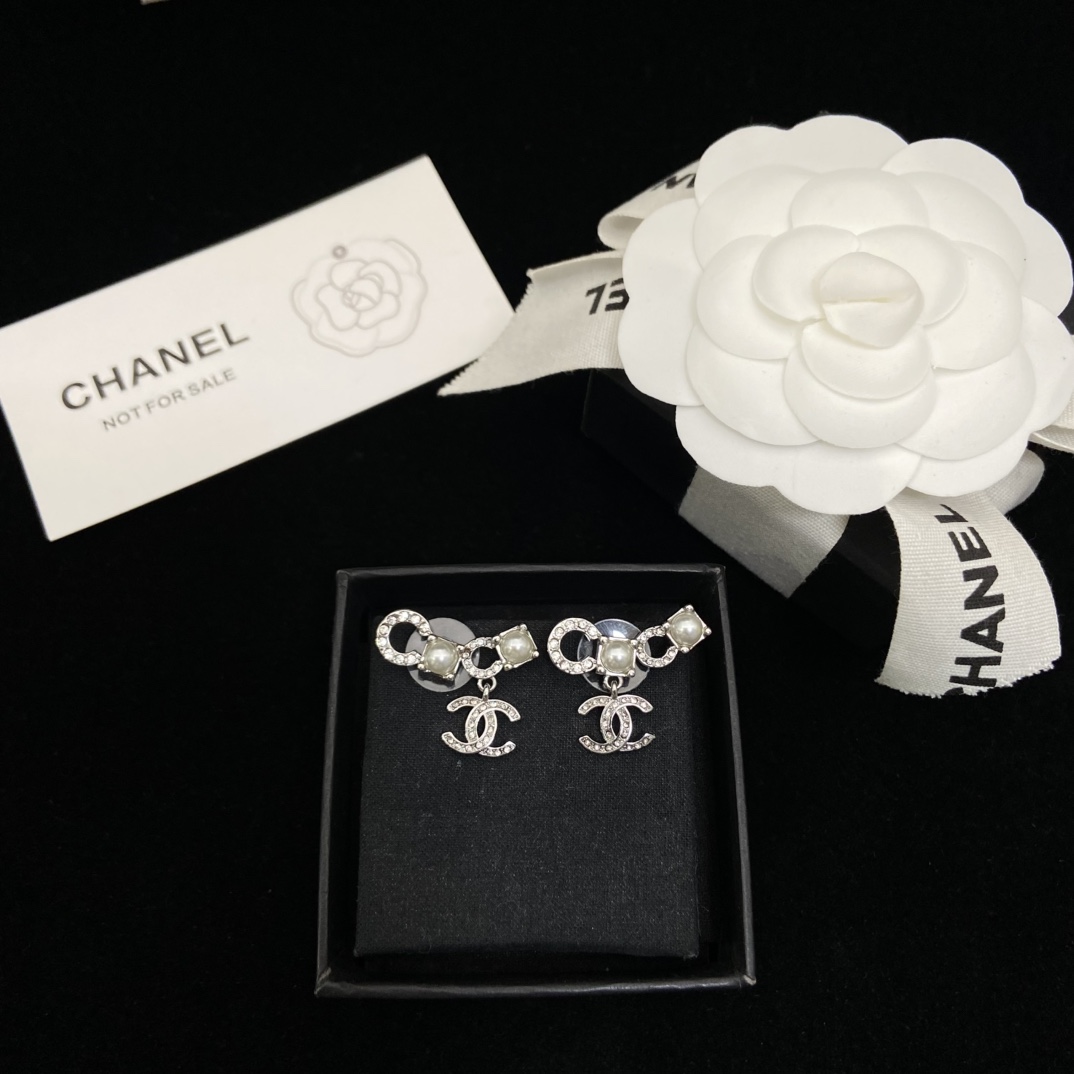 Chanel CoCo pearl double C stud earrings