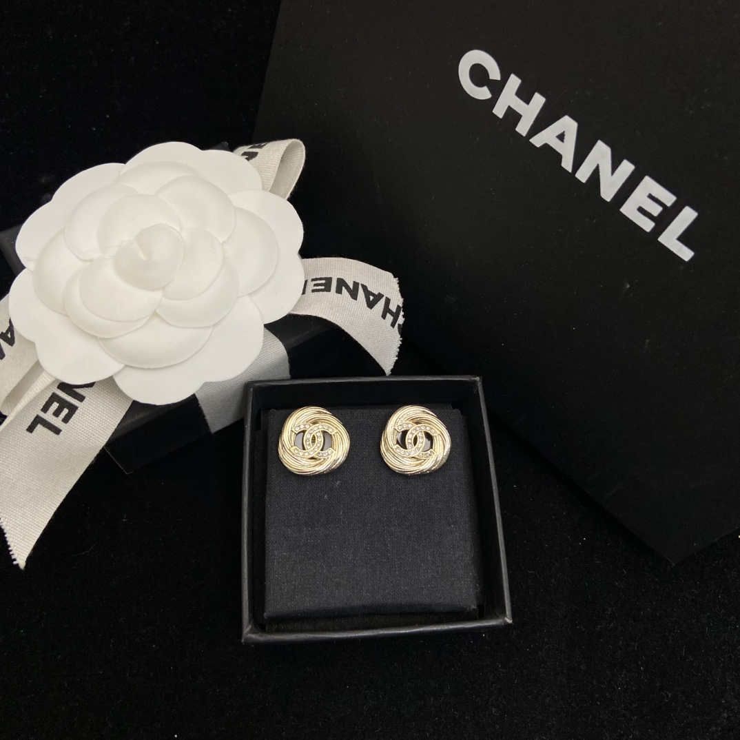Chanel's new round brushed round stud earrings