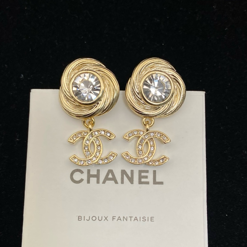Chanel's round brushed round sparkling stud earrings