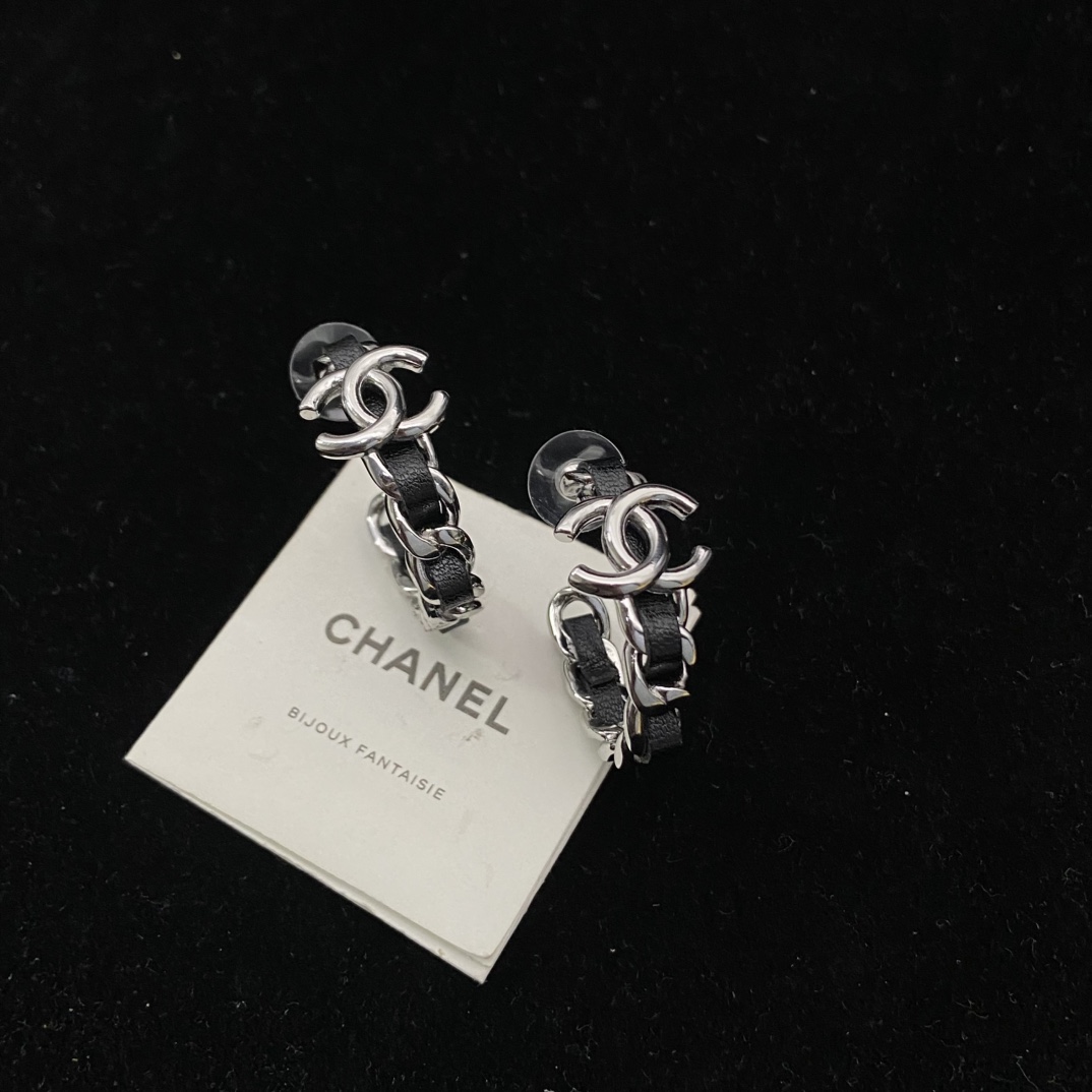 Chanel's  black hoop stud earrings