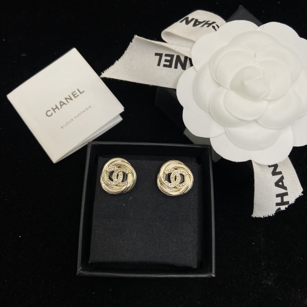Chanel's new round brushed round stud earrings