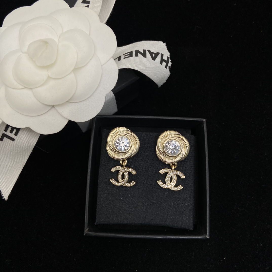 Chanel's round brushed round sparkling stud earrings